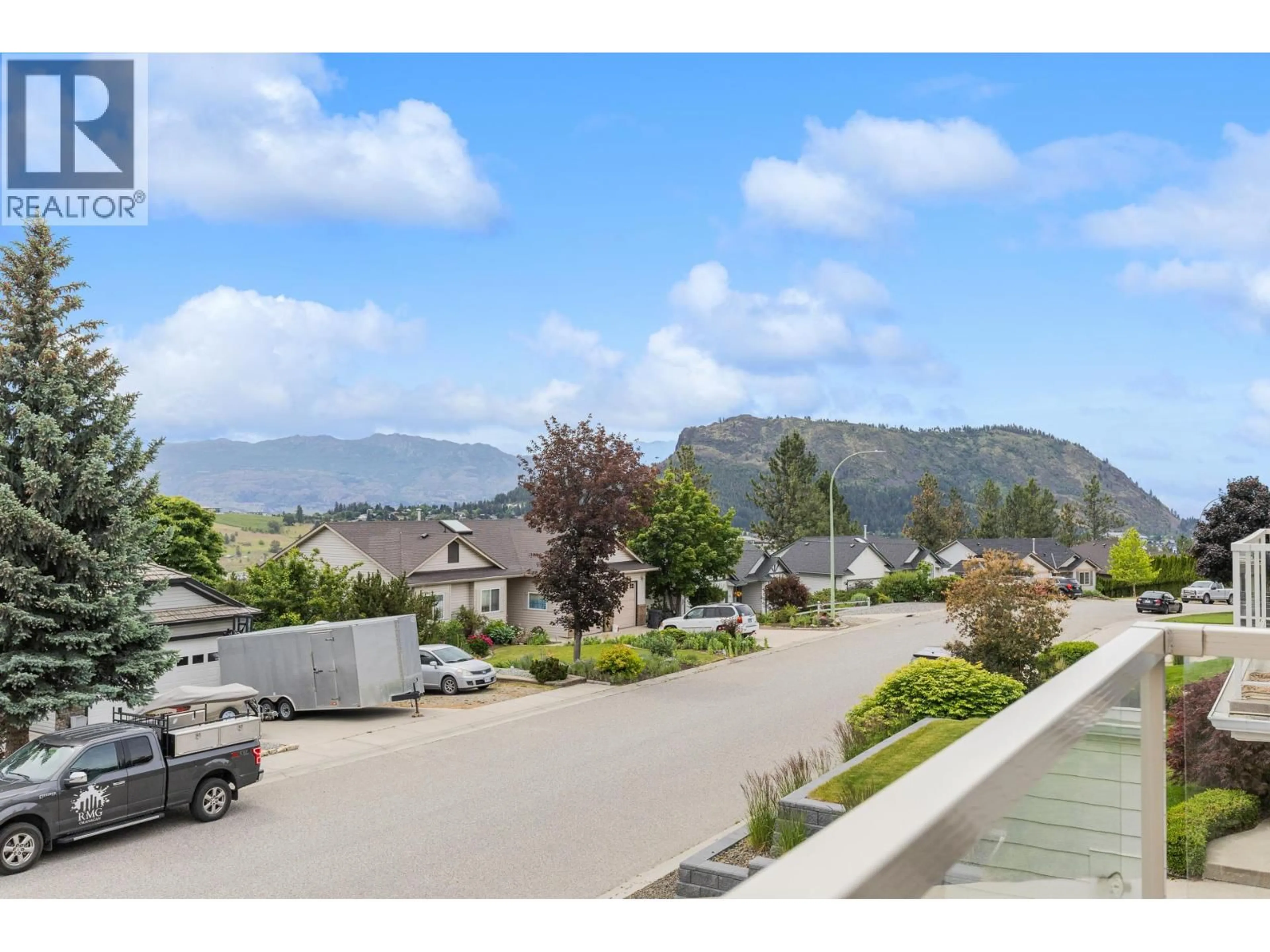 A pic from outside/outdoor area/front of a property/back of a property/a pic from drone, mountain view for 2042 MOONBEAM CLOSE, West Kelowna British Columbia V1Z3X9