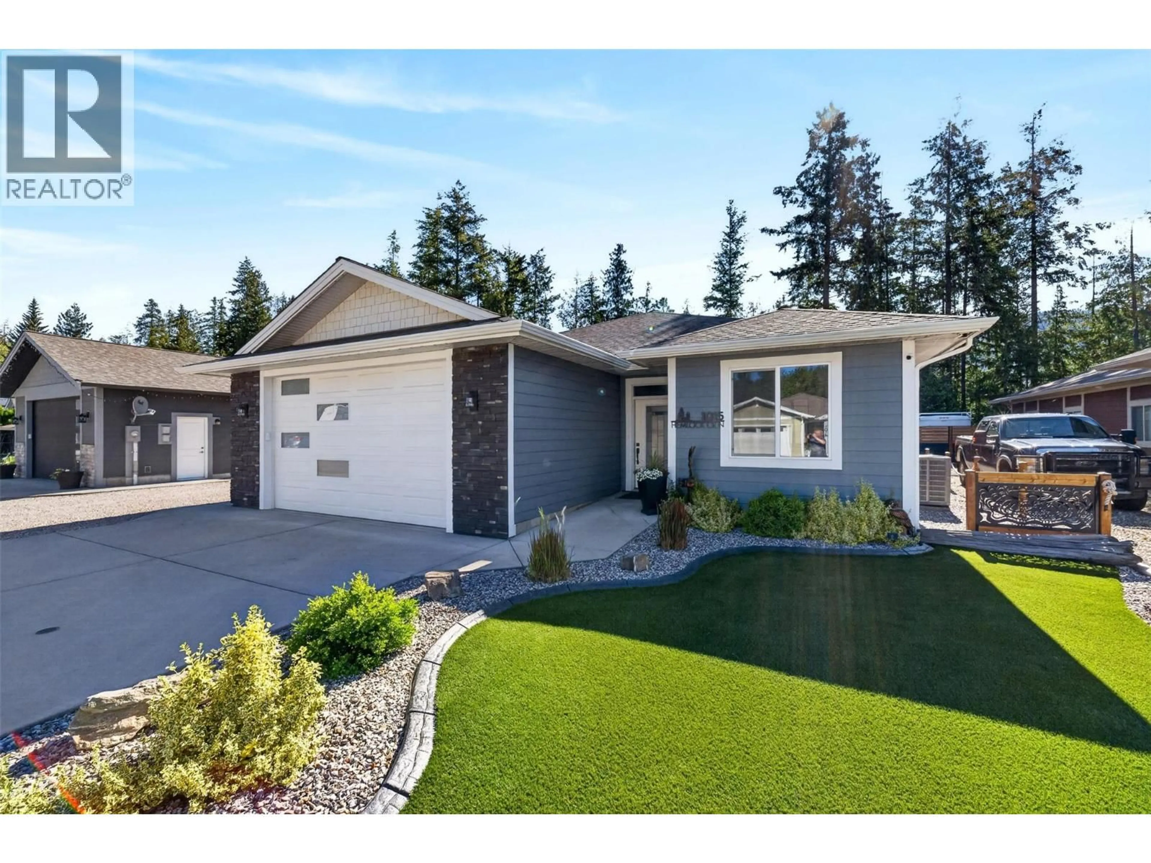 Home with vinyl exterior material, street for 1015 HEMLOCK CRESCENT NORTH, Sicamous British Columbia V0E2V1