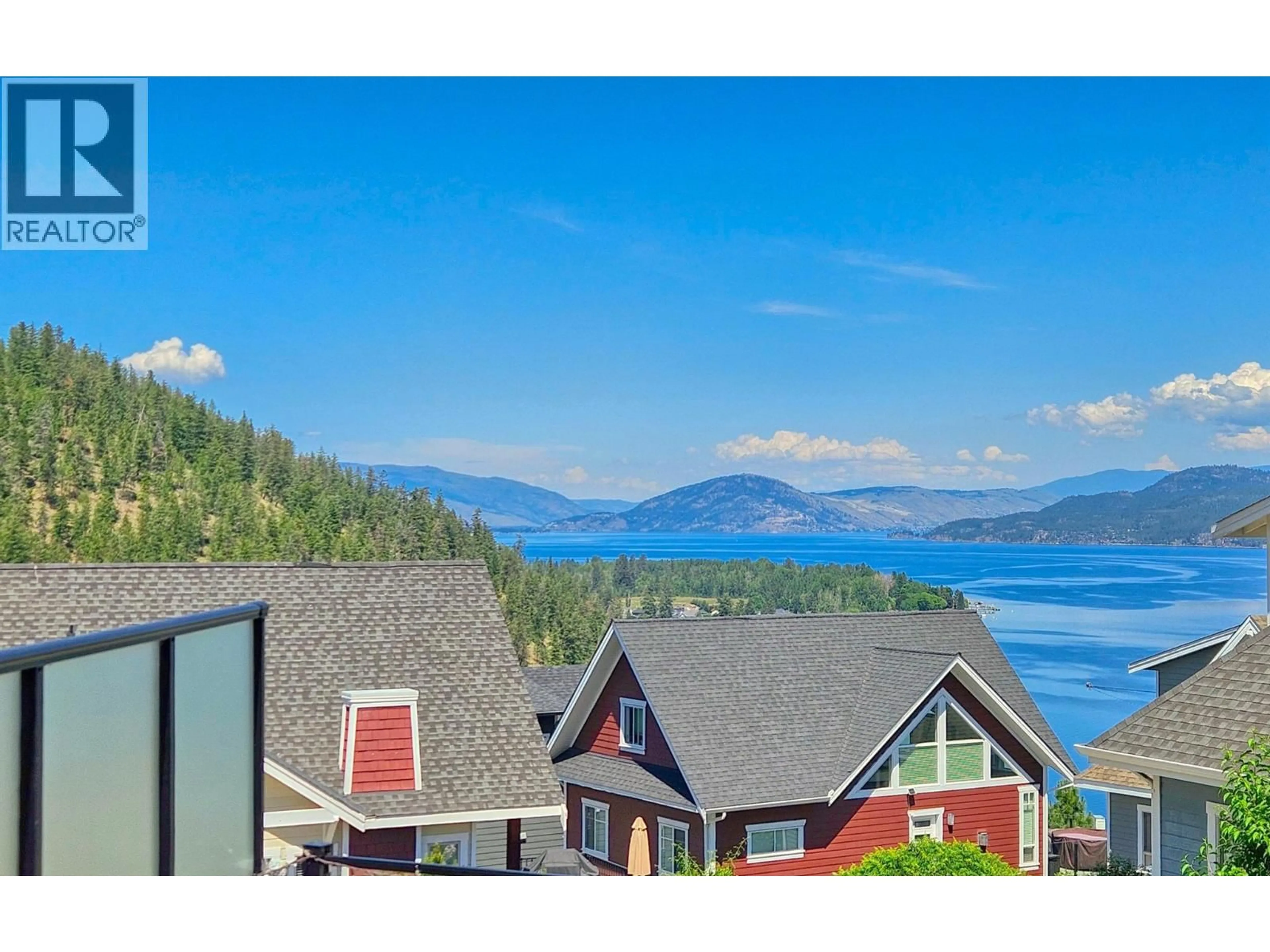 A pic from outside/outdoor area/front of a property/back of a property/a pic from drone, water/lake/river/ocean view for 164 - 6816 SANTIAGO LOOP, Kelowna British Columbia V1Z3R8