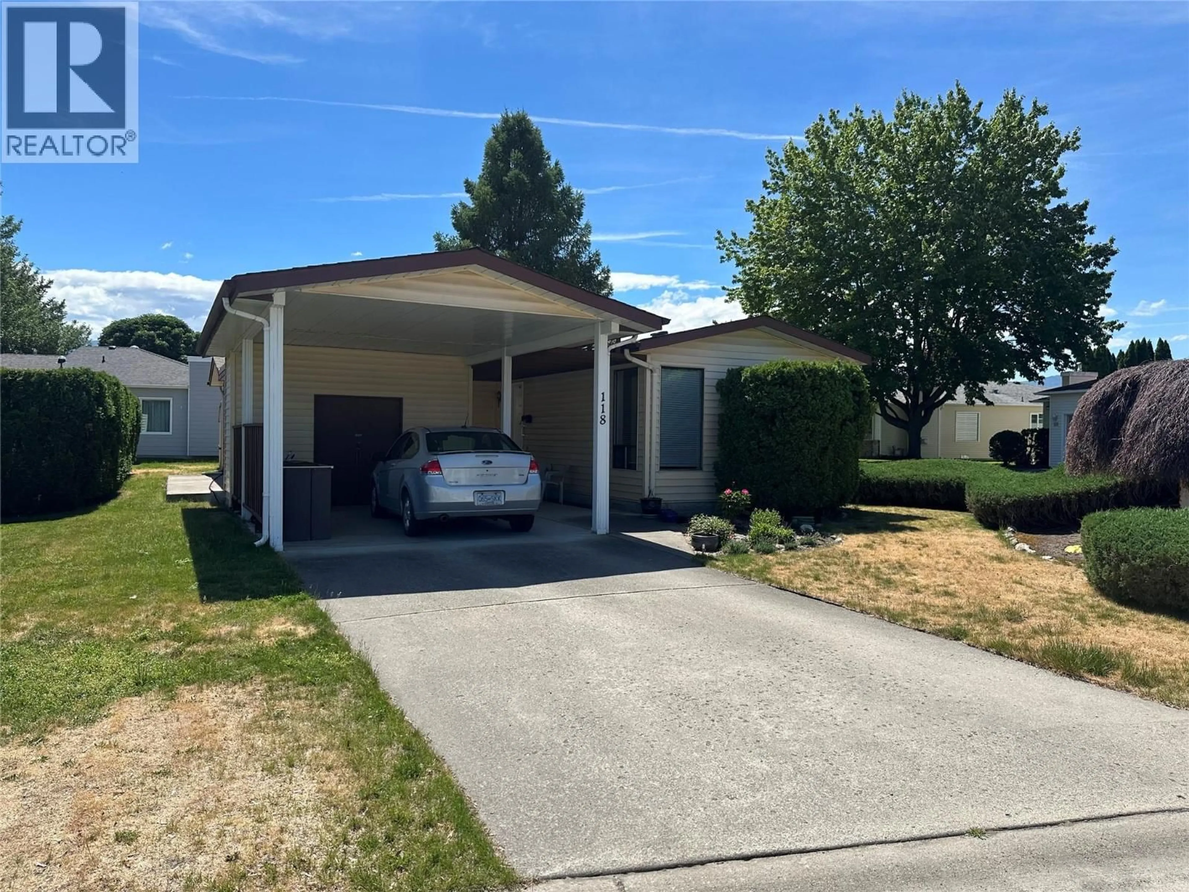 Home with vinyl exterior material, street for 118 - 1255 RAYMER AVENUE, Kelowna British Columbia V1W3S3