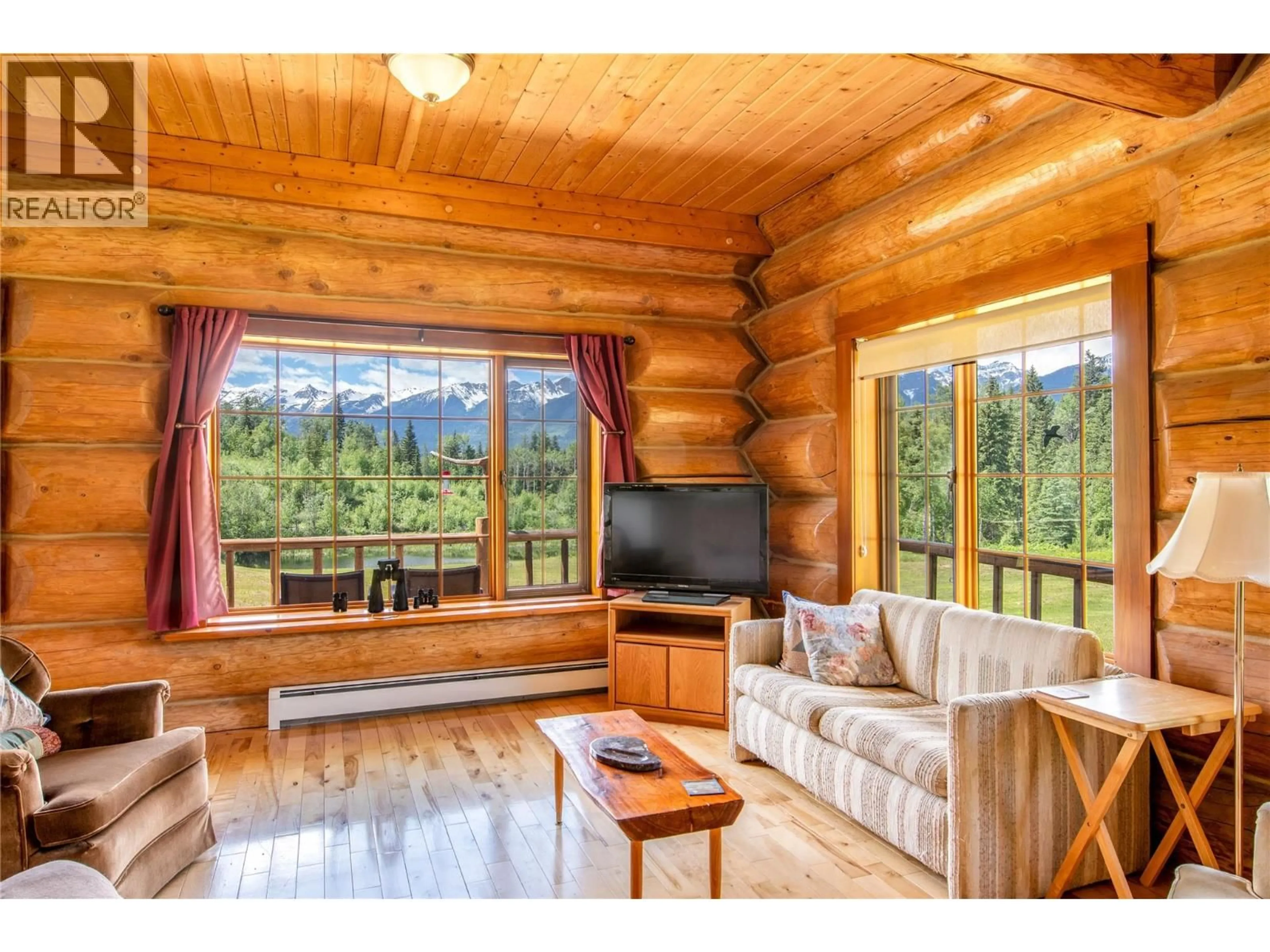 Living room with furniture, wood/laminate floor for 1360 ADOLPH JOHNSON ROAD, Golden British Columbia V0A1H1