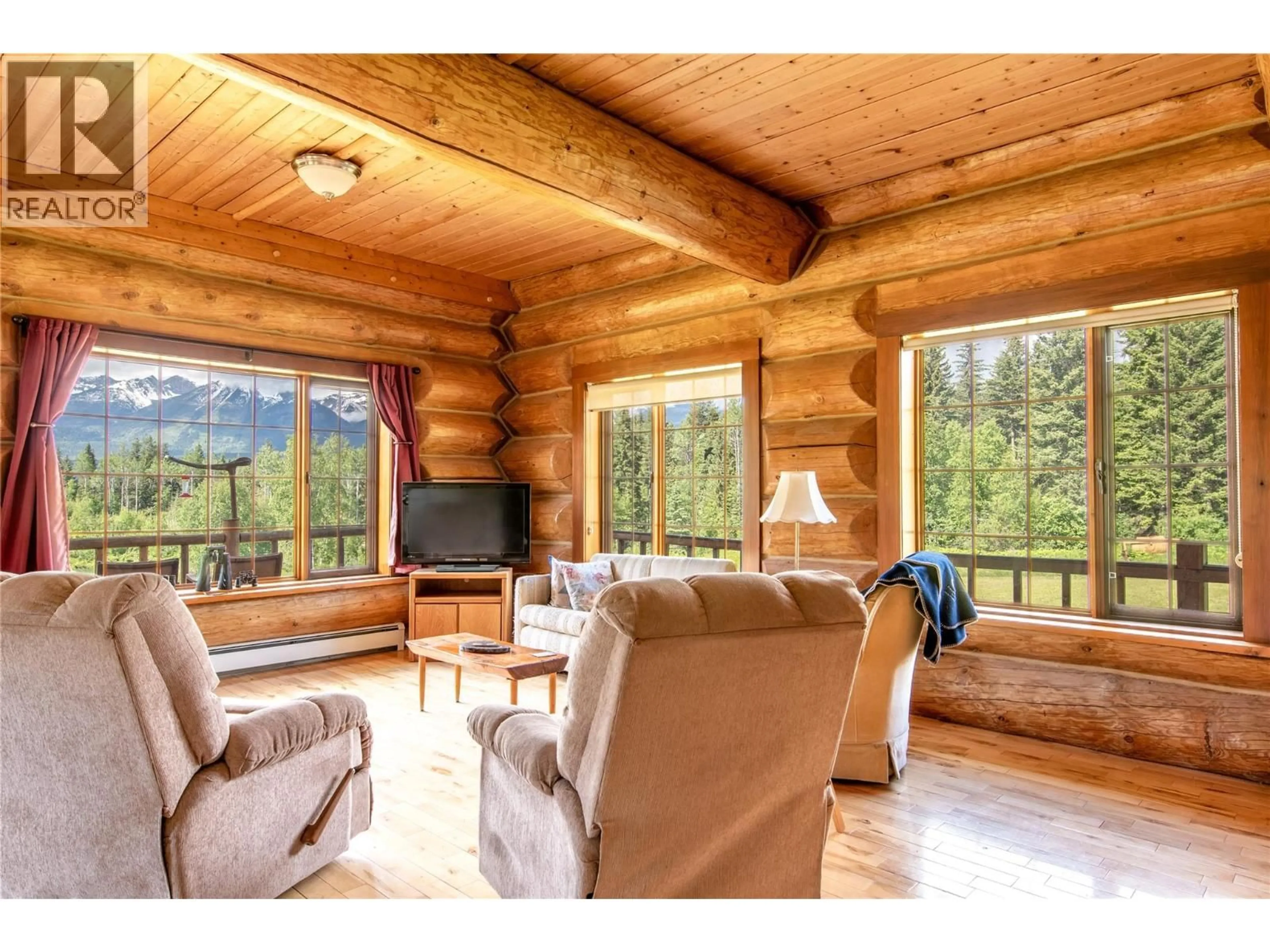 Living room with furniture, wood/laminate floor for 1360 ADOLPH JOHNSON ROAD, Golden British Columbia V0A1H1