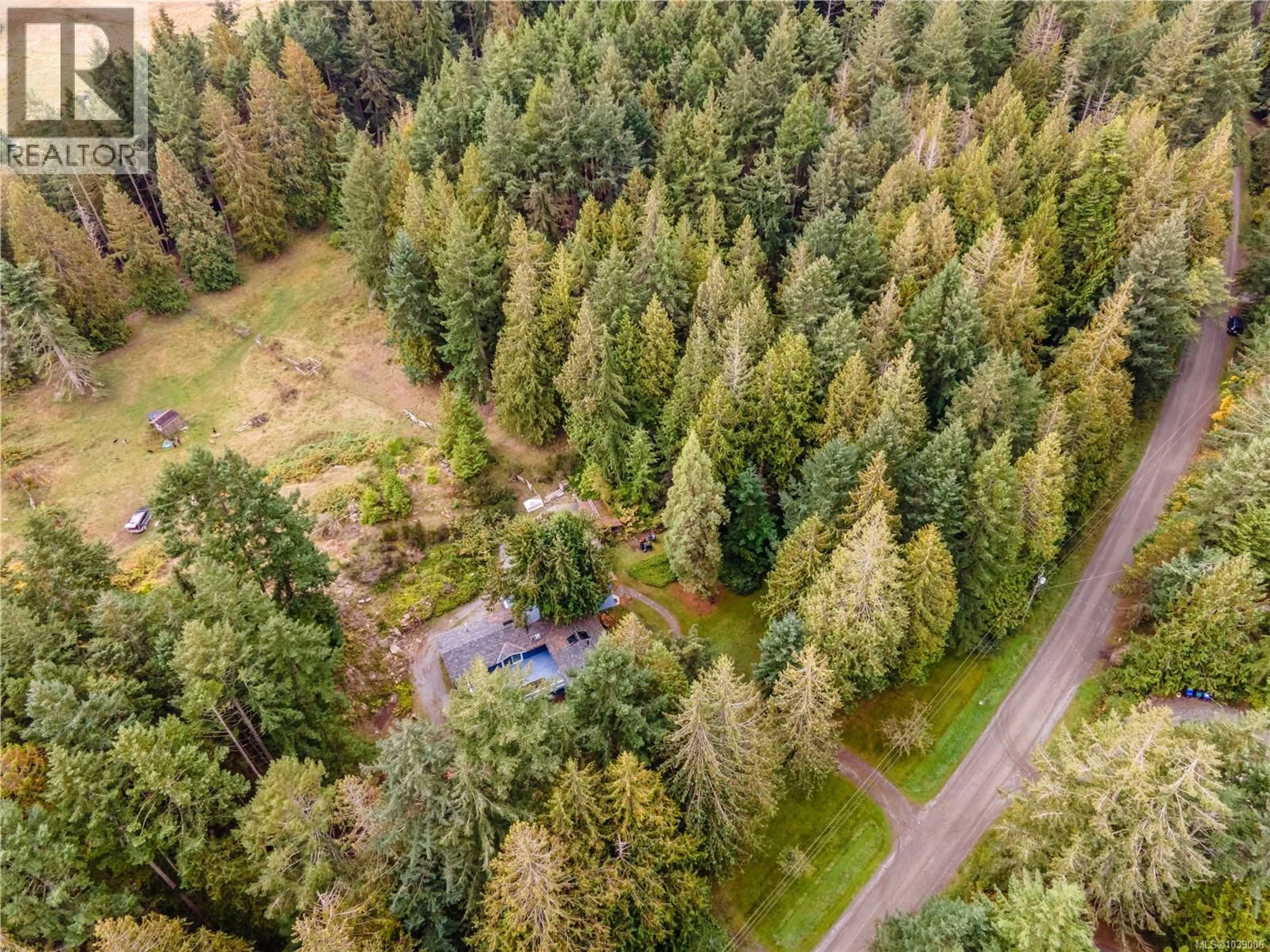 A pic from outside/outdoor area/front of a property/back of a property/a pic from drone, forest/trees view for 336 HEMLOCK AVENUE, Gabriola Island British Columbia V0R1X1