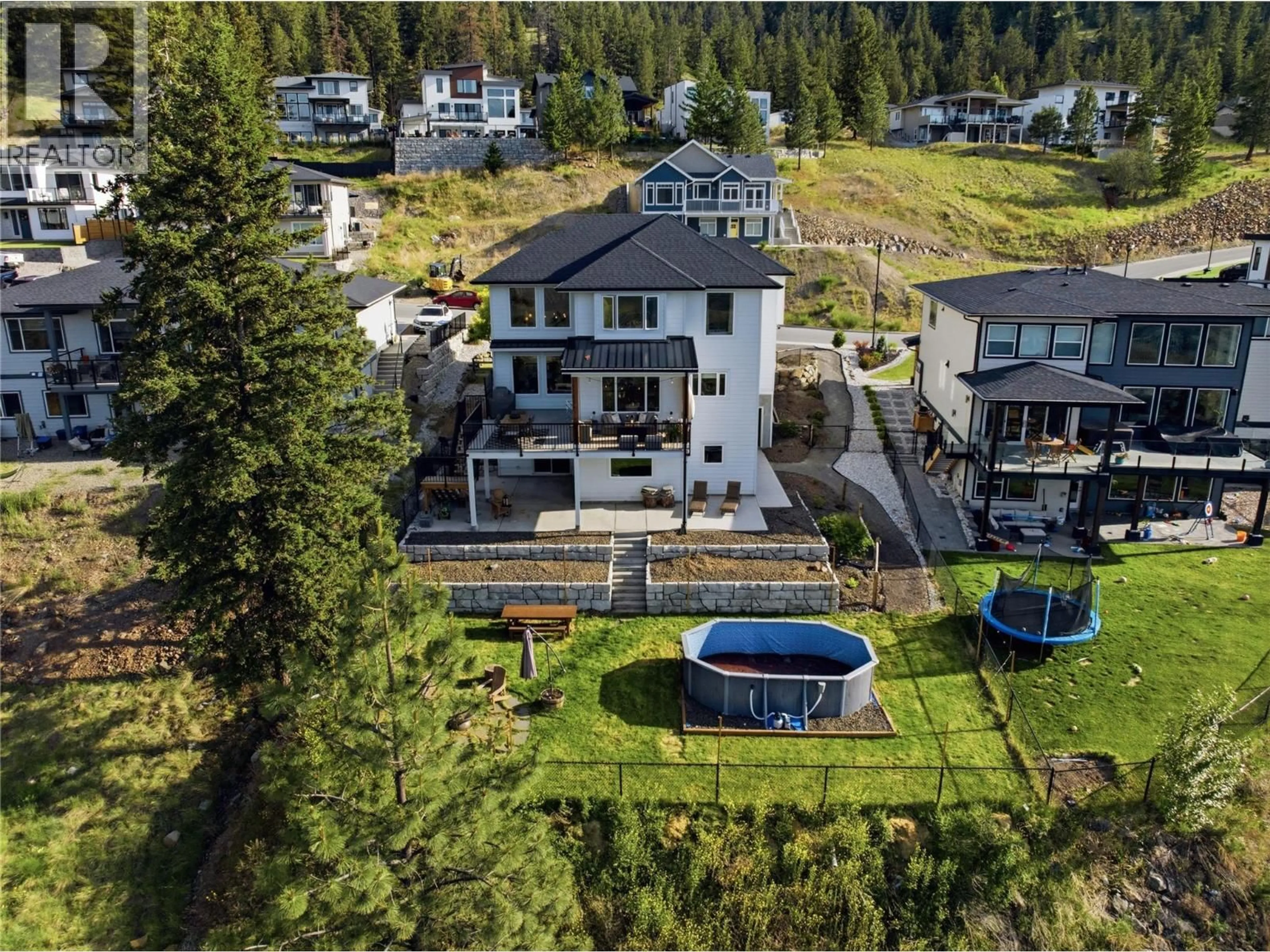 A pic from outside/outdoor area/front of a property/back of a property/a pic from drone, mountain view for 1688 BALSAM PLACE, Kamloops British Columbia V2E0E2