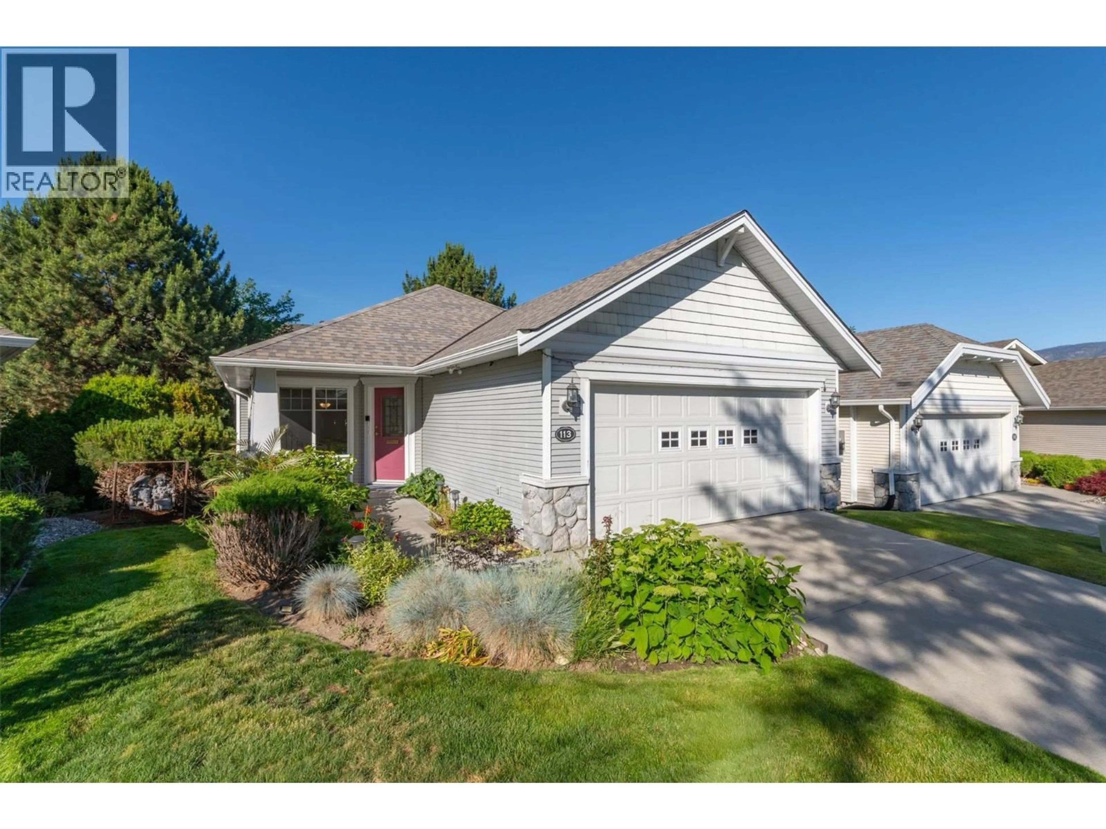 Home with vinyl exterior material, street for 113 - 1321 RIDGEWAY DRIVE, Kelowna British Columbia V1Y9T6