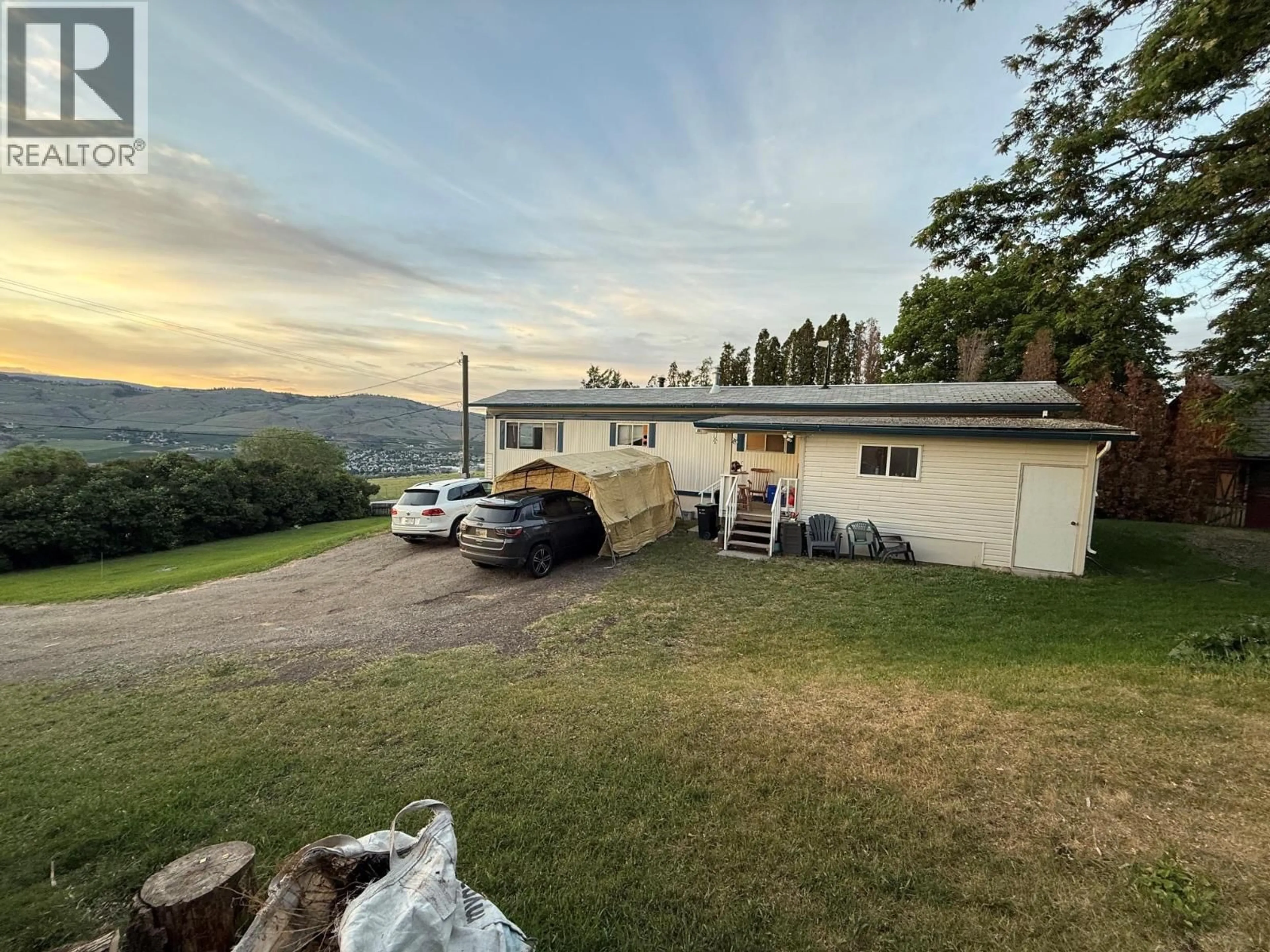 A pic from outside/outdoor area/front of a property/back of a property/a pic from drone, water/lake/river/ocean view for 825 MISSION ROAD, Vernon British Columbia V1H1G2