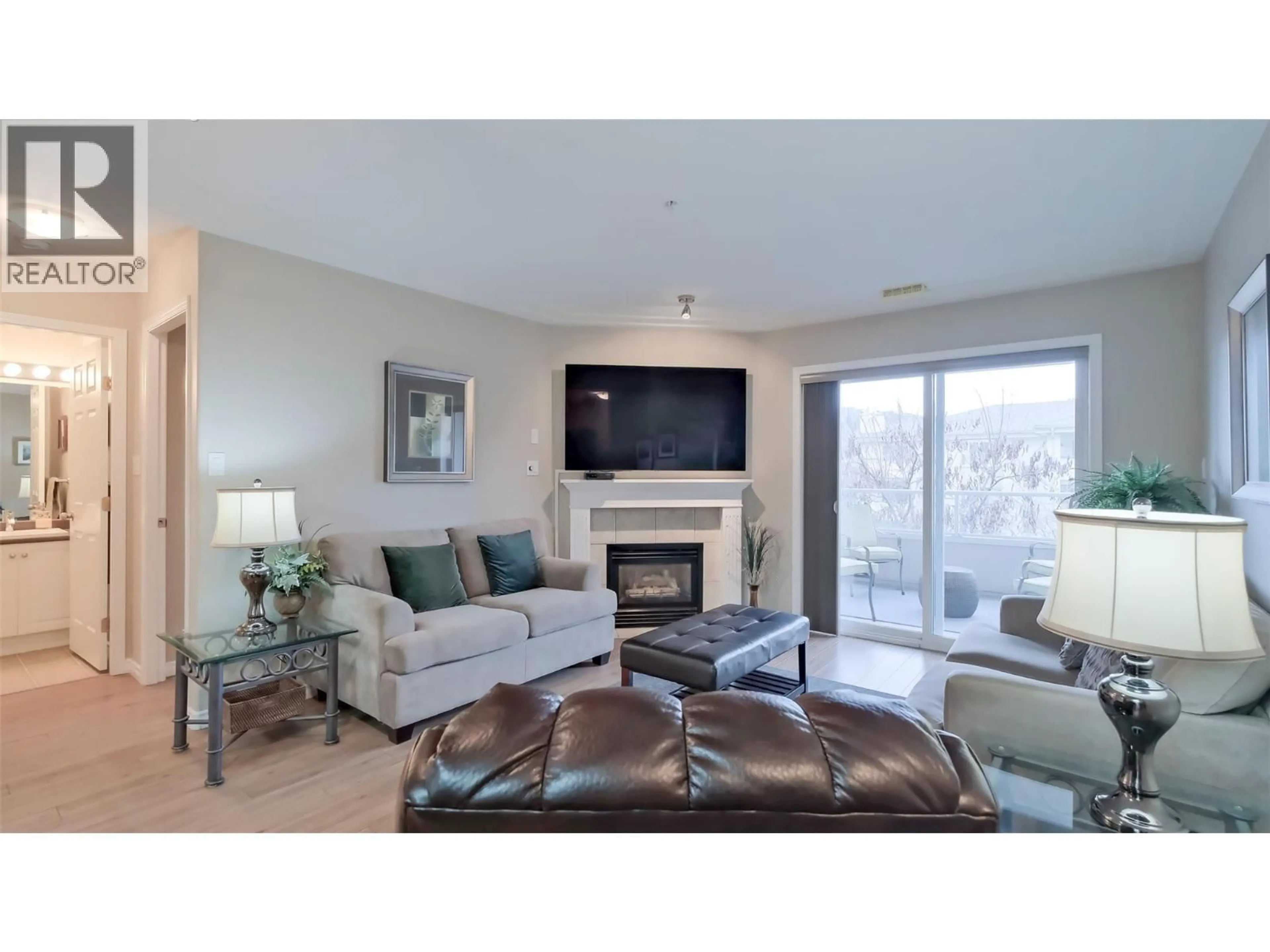 Living room with furniture, unknown for 405 - 1966 DURNIN ROAD, Kelowna British Columbia V1X7Z2