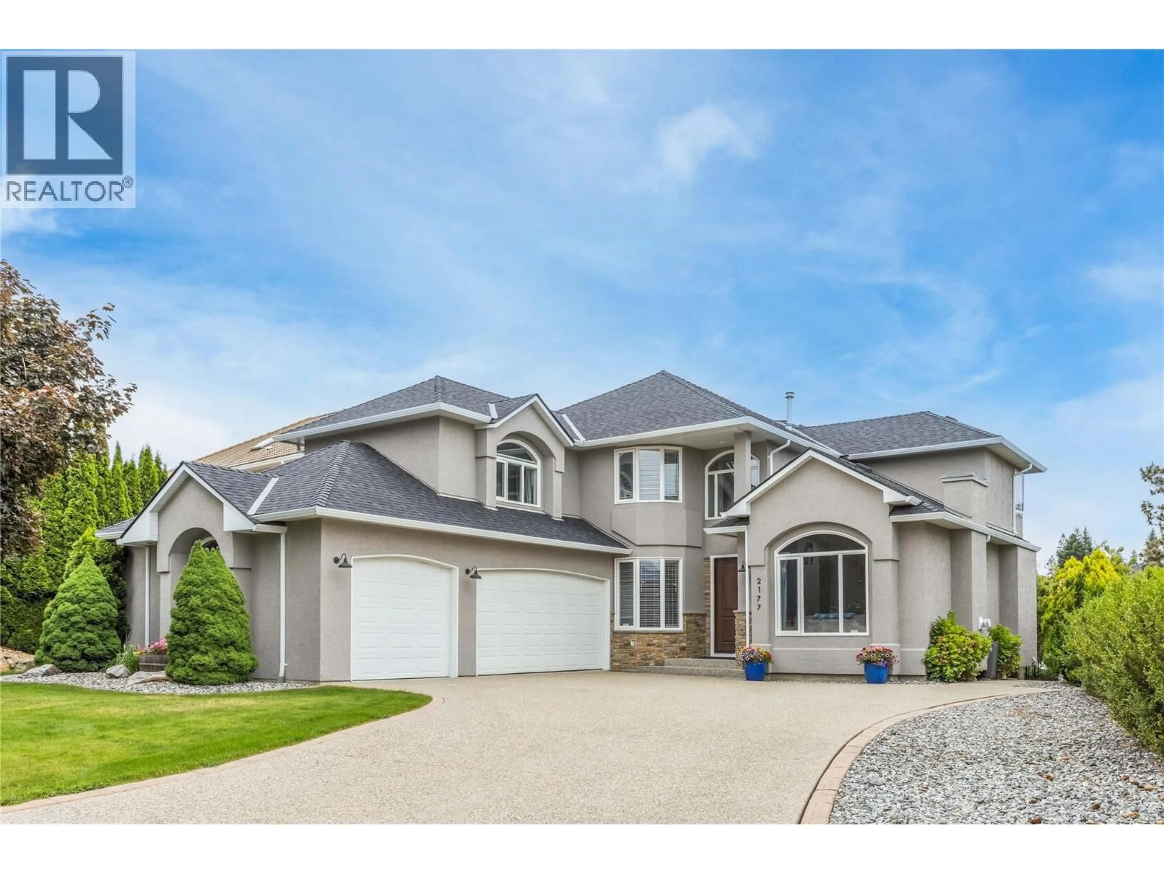 Home with vinyl exterior material, street for 2177 BRECKENRIDGE COURT, Kelowna British Columbia V1V1W2