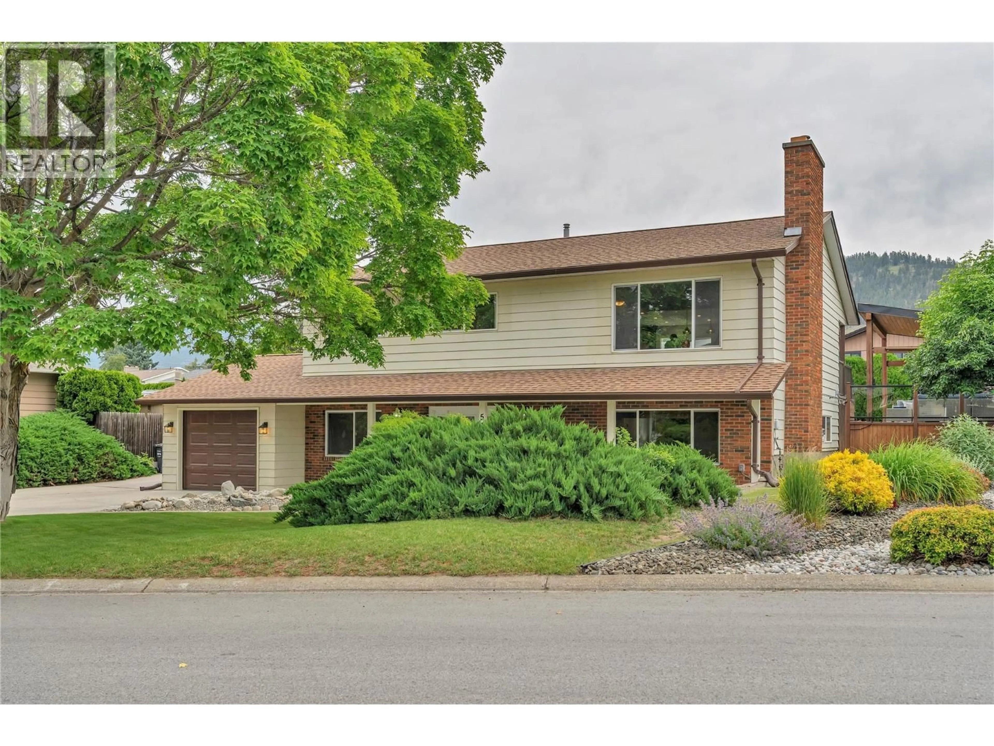 Home with brick exterior material, street for 542 TRURO STREET, Penticton British Columbia V2A6W4