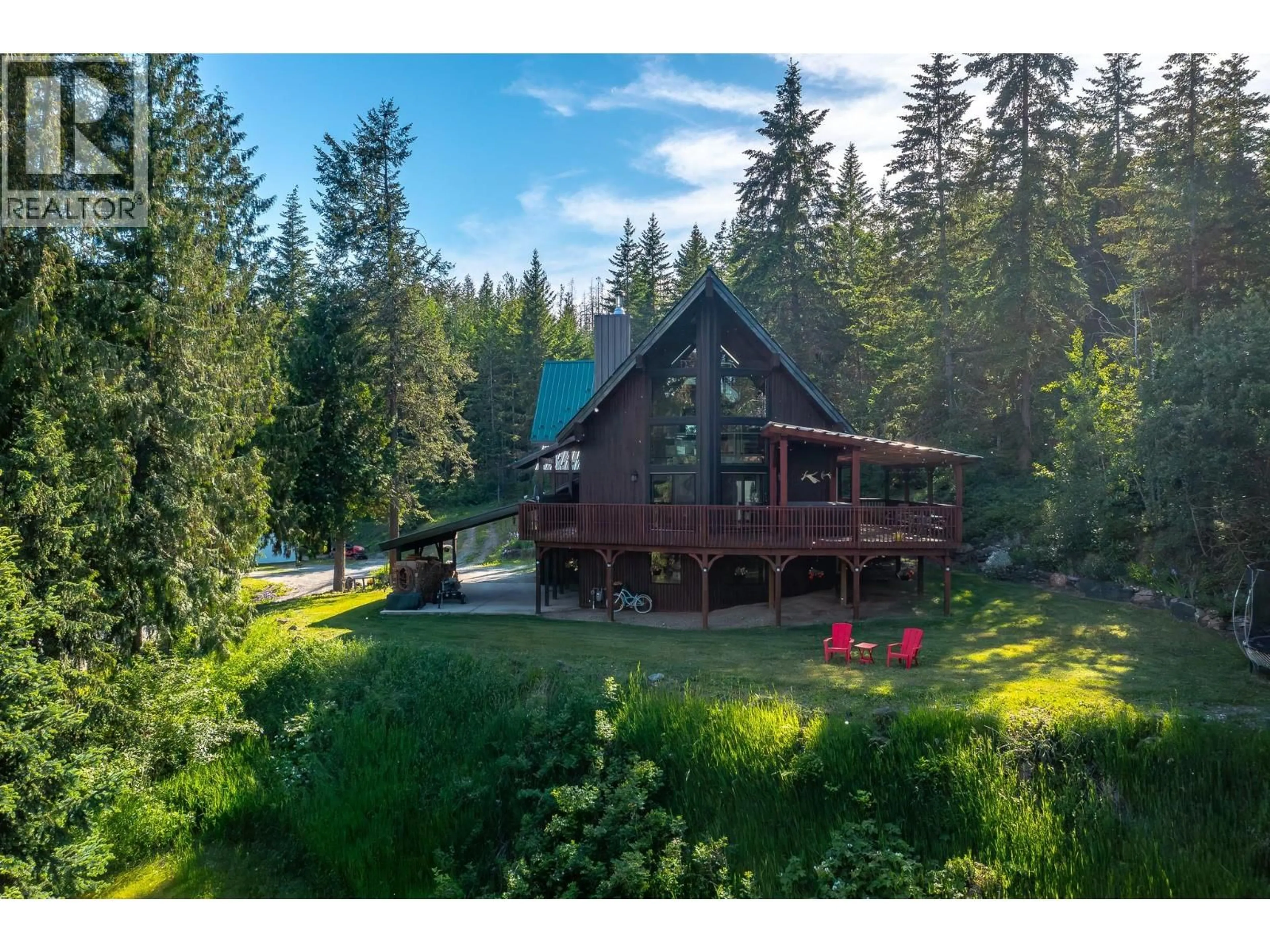 A pic from outside/outdoor area/front of a property/back of a property/a pic from drone, forest/trees view for 424 GLENMARY ROAD, Enderby British Columbia V0E1V3