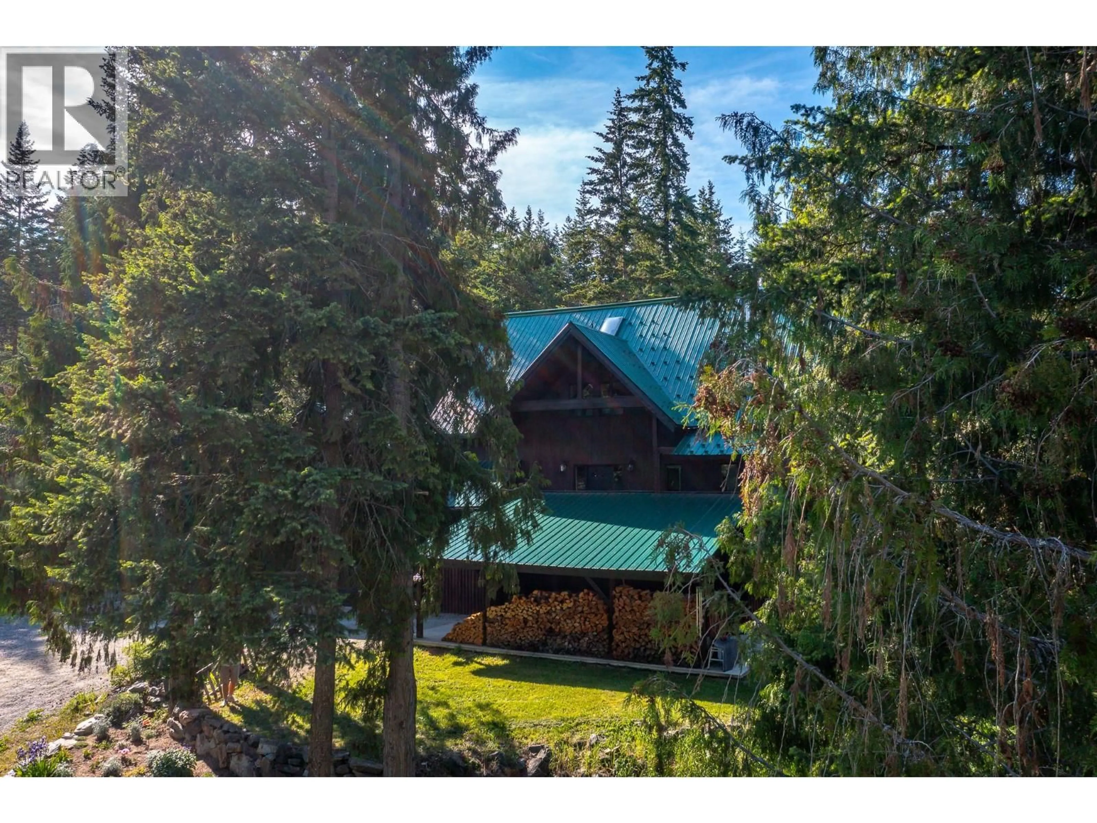 A pic from outside/outdoor area/front of a property/back of a property/a pic from drone, mountain view for 424 GLENMARY ROAD, Enderby British Columbia V0E1V3