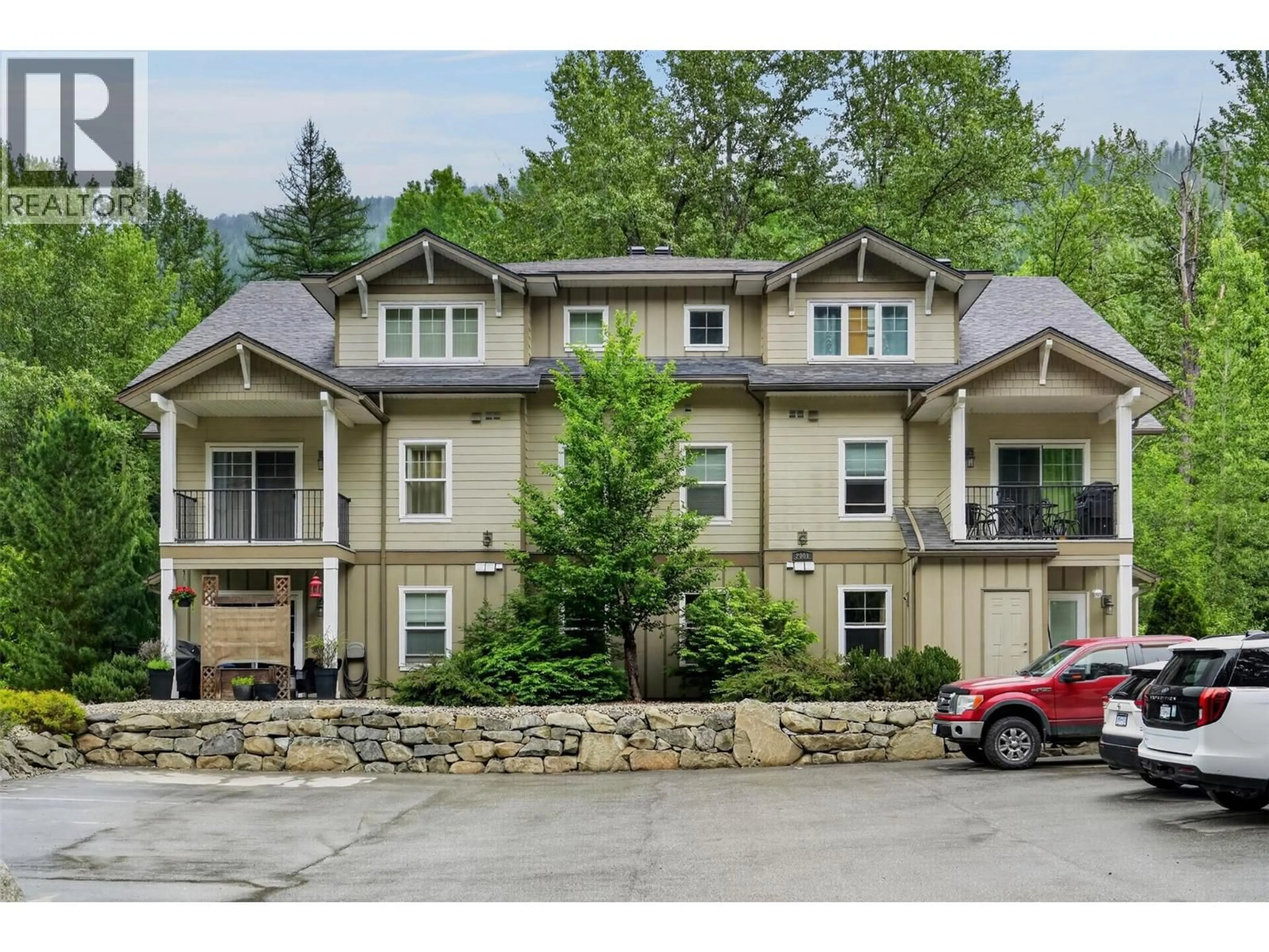 A pic from outside/outdoor area/front of a property/back of a property/a pic from drone, mountain view for 102 - 2001 PERRIER ROAD, Nelson British Columbia V1L6Y8