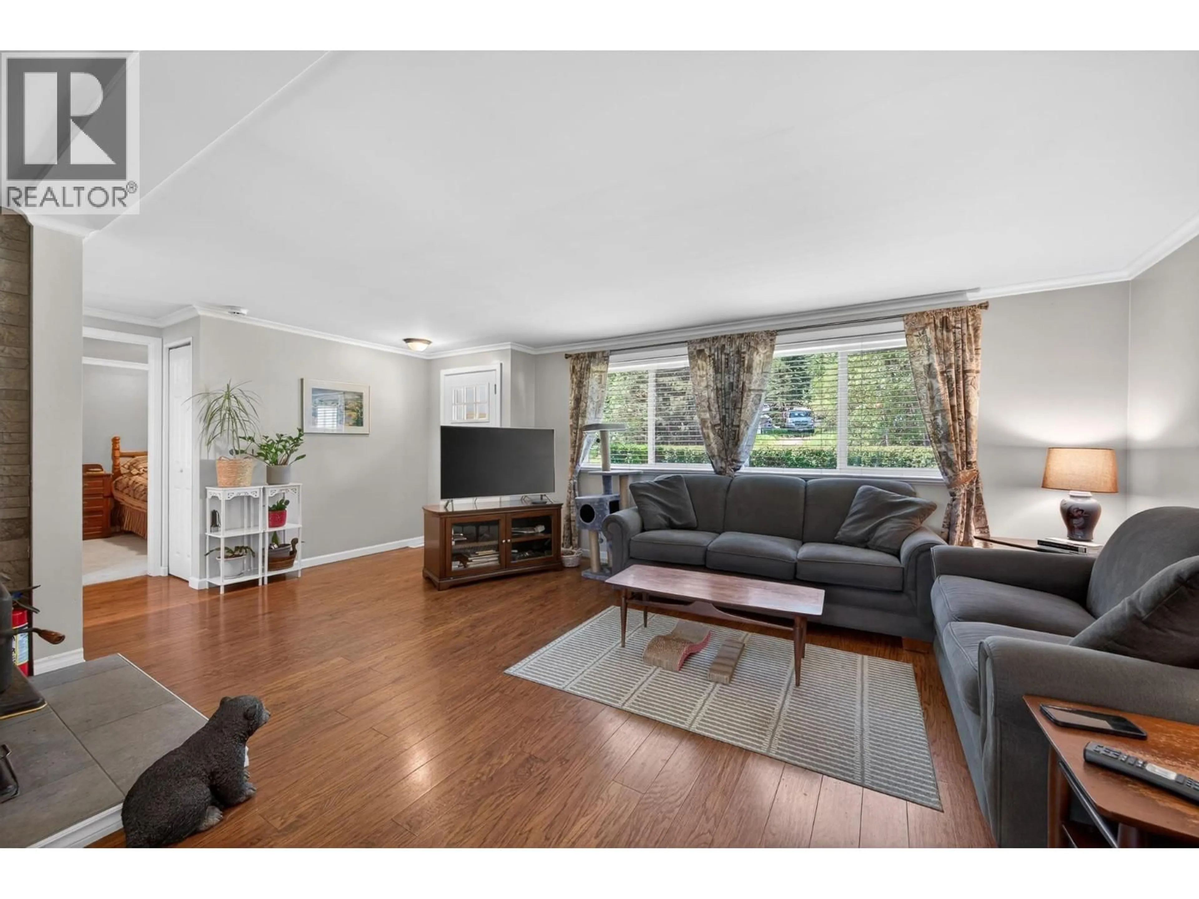 Living room with furniture, wood/laminate floor for 2873 PARADISE ROAD, Kamloops British Columbia V0E3E1
