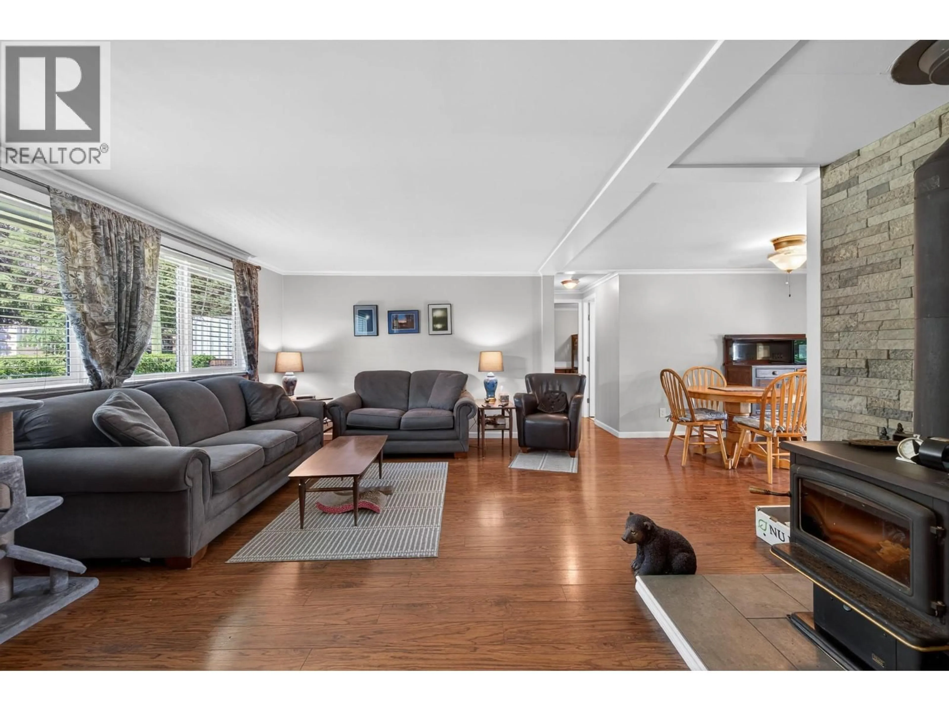 Living room with furniture, wood/laminate floor for 2873 PARADISE ROAD, Kamloops British Columbia V0E3E1