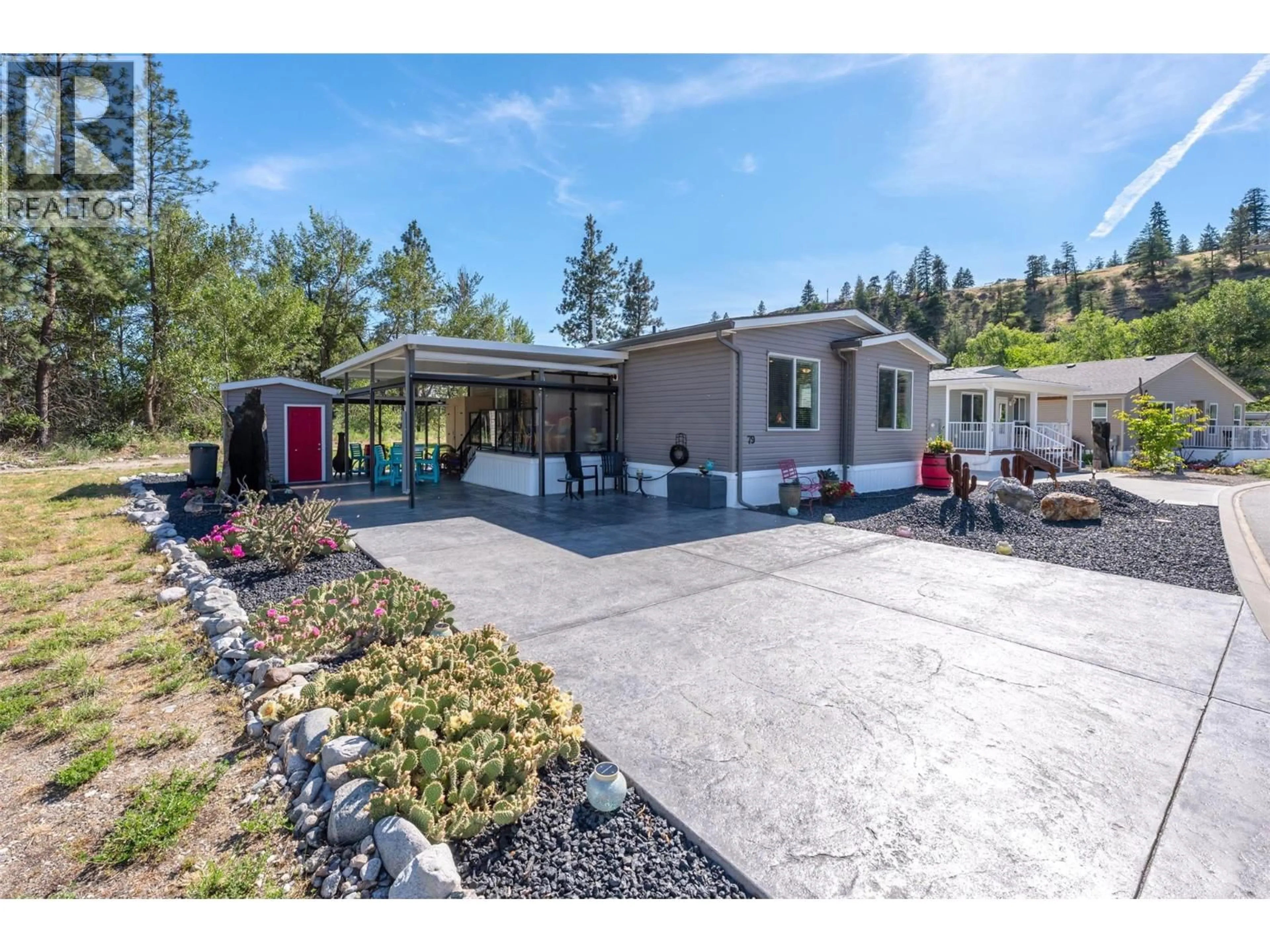 Home with vinyl exterior material, street for 79 - 8598 97 HIGHWAY, Oliver British Columbia V0H1T2