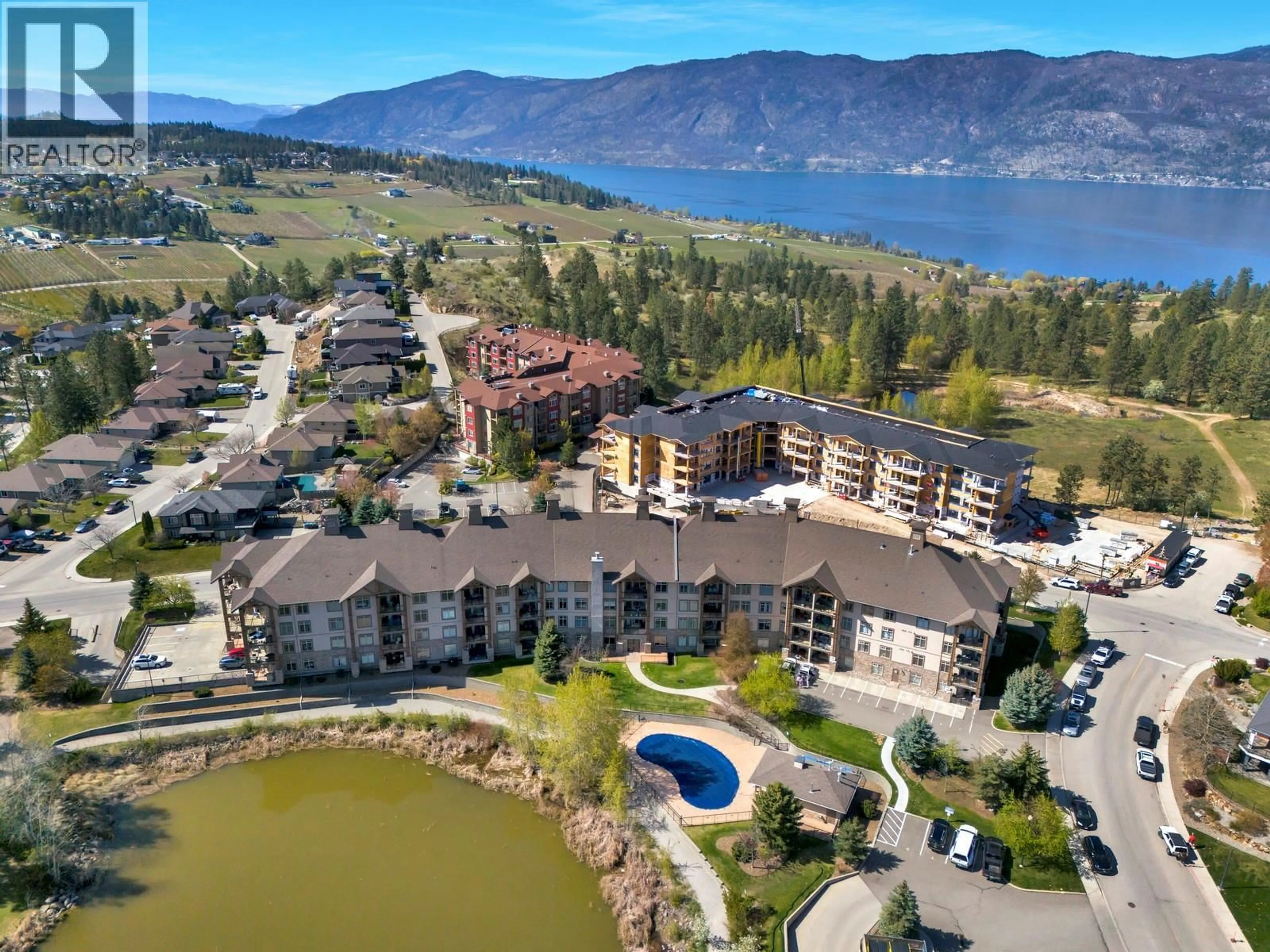 A pic from outside/outdoor area/front of a property/back of a property/a pic from drone, water/lake/river/ocean view for 113 - 2551 SHORELINE DRIVE, Lake Country British Columbia V4V2P2