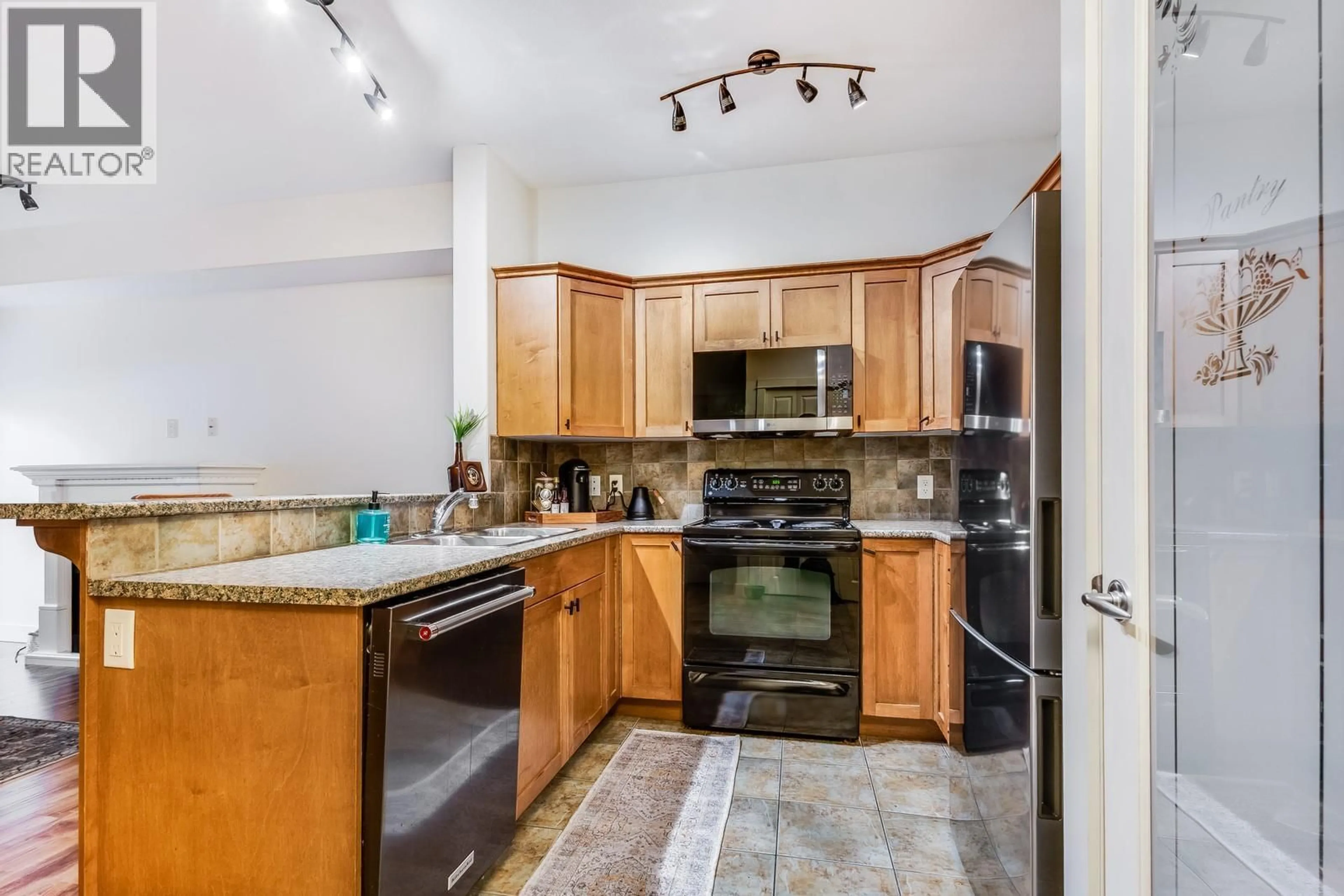Standard kitchen, ceramic/tile floor for 113 - 2551 SHORELINE DRIVE, Lake Country British Columbia V4V2P2