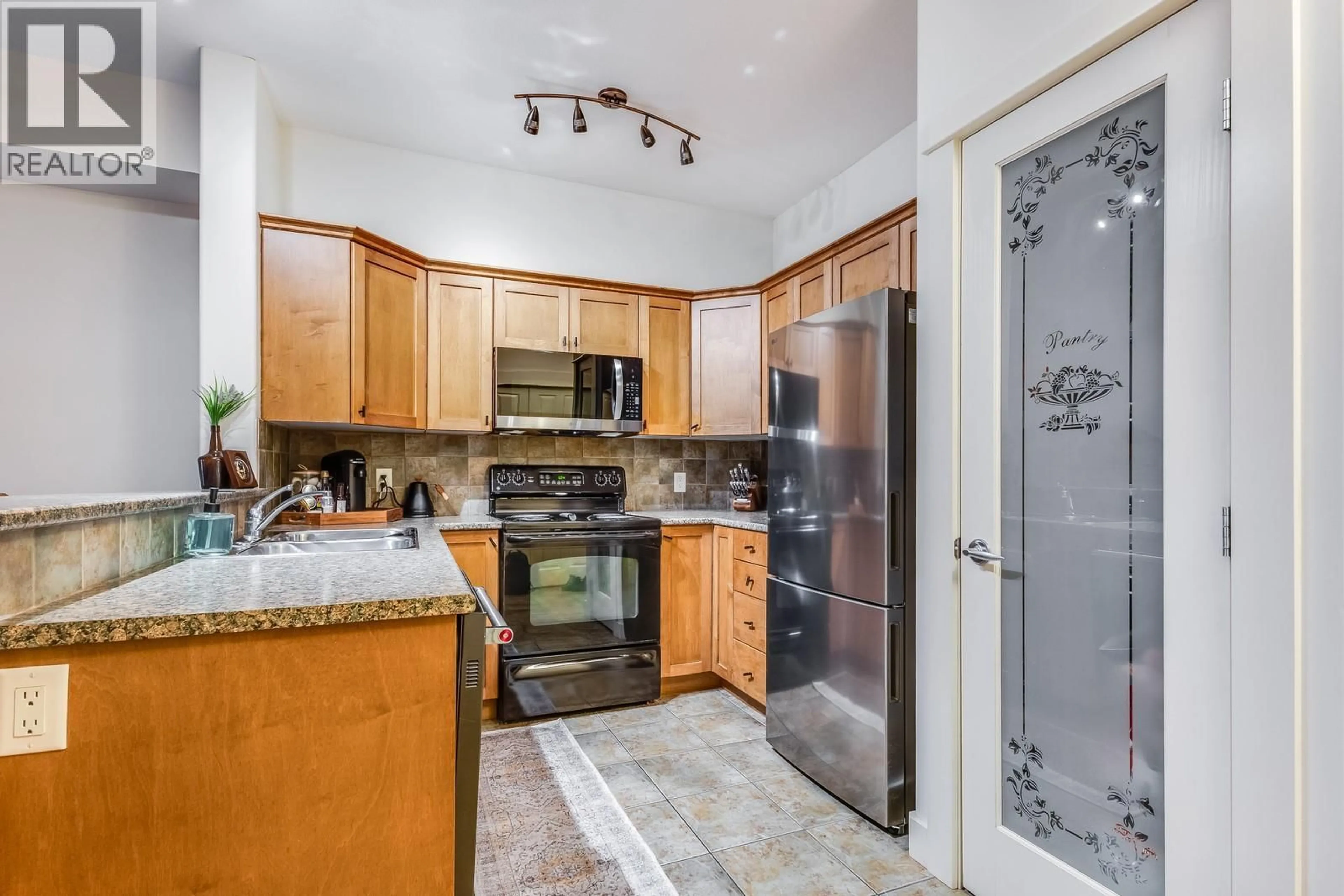 Standard kitchen, ceramic/tile floor for 113 - 2551 SHORELINE DRIVE, Lake Country British Columbia V4V2P2