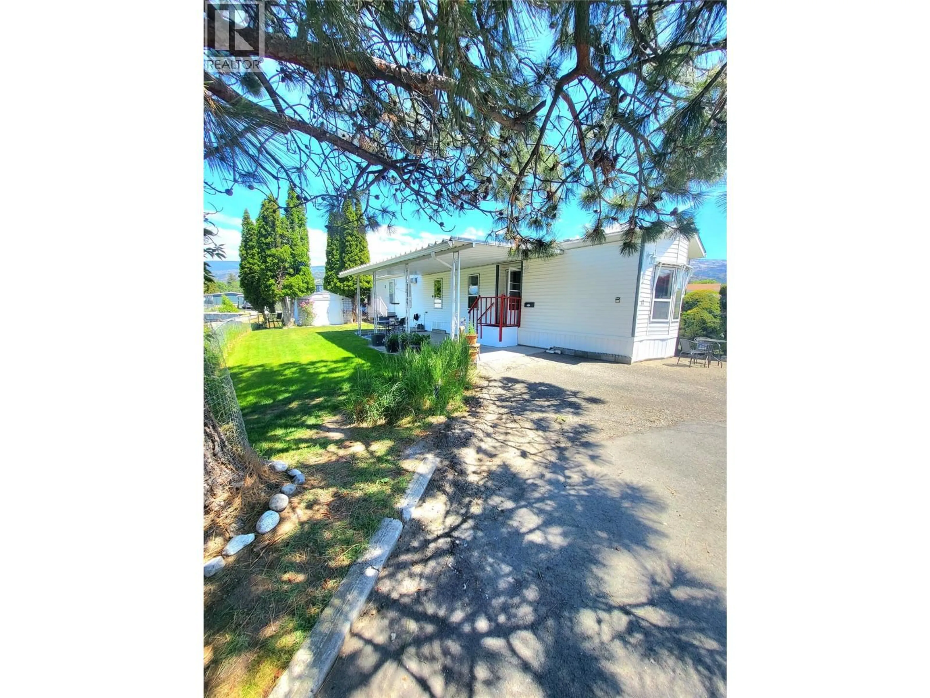 A pic from outside/outdoor area/front of a property/back of a property/a pic from drone, street for 12 - 321 YORKTON AVENUE, Penticton British Columbia V2A3V6