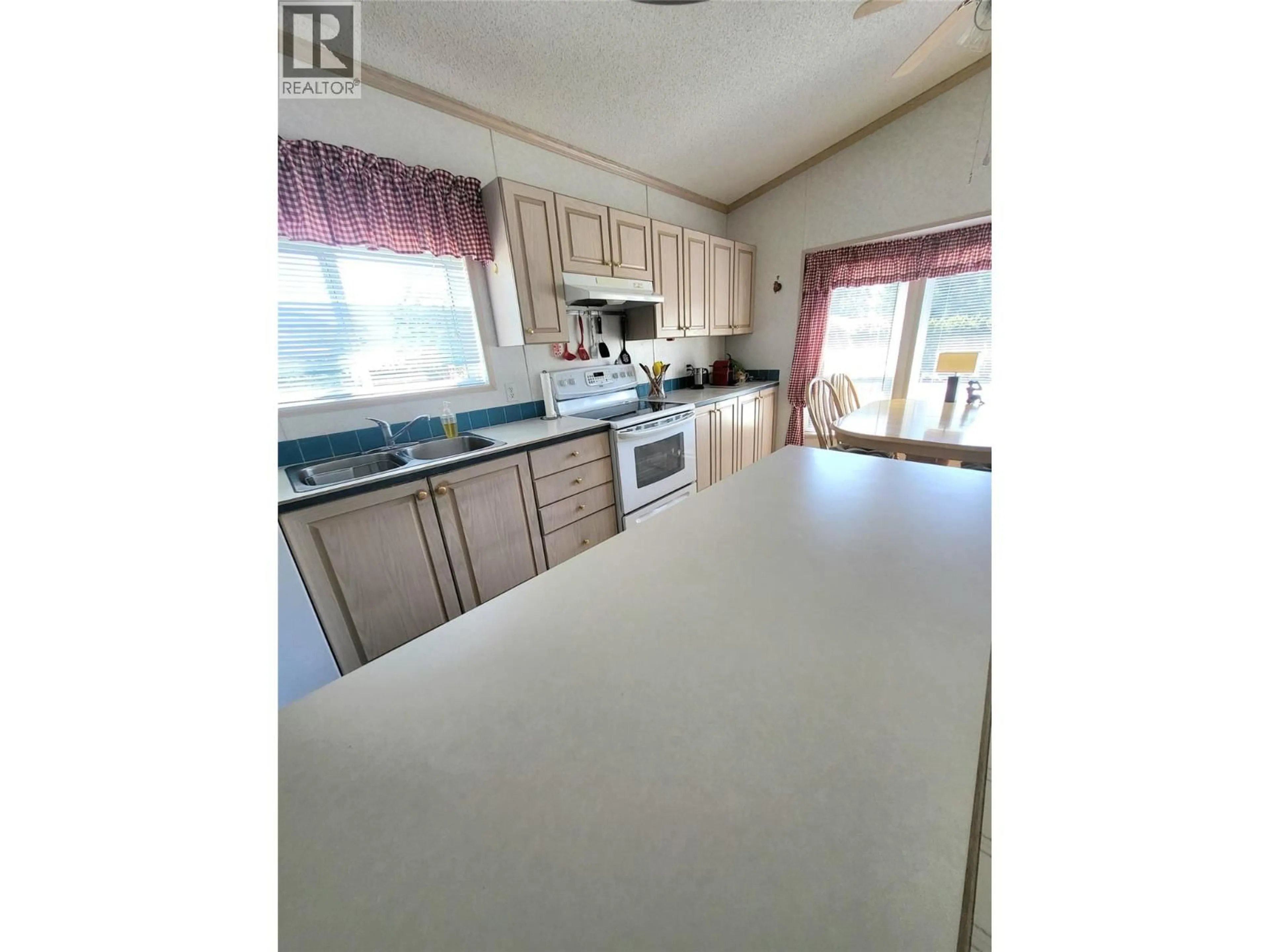 Open concept kitchen, unknown for 12 - 321 YORKTON AVENUE, Penticton British Columbia V2A3V6
