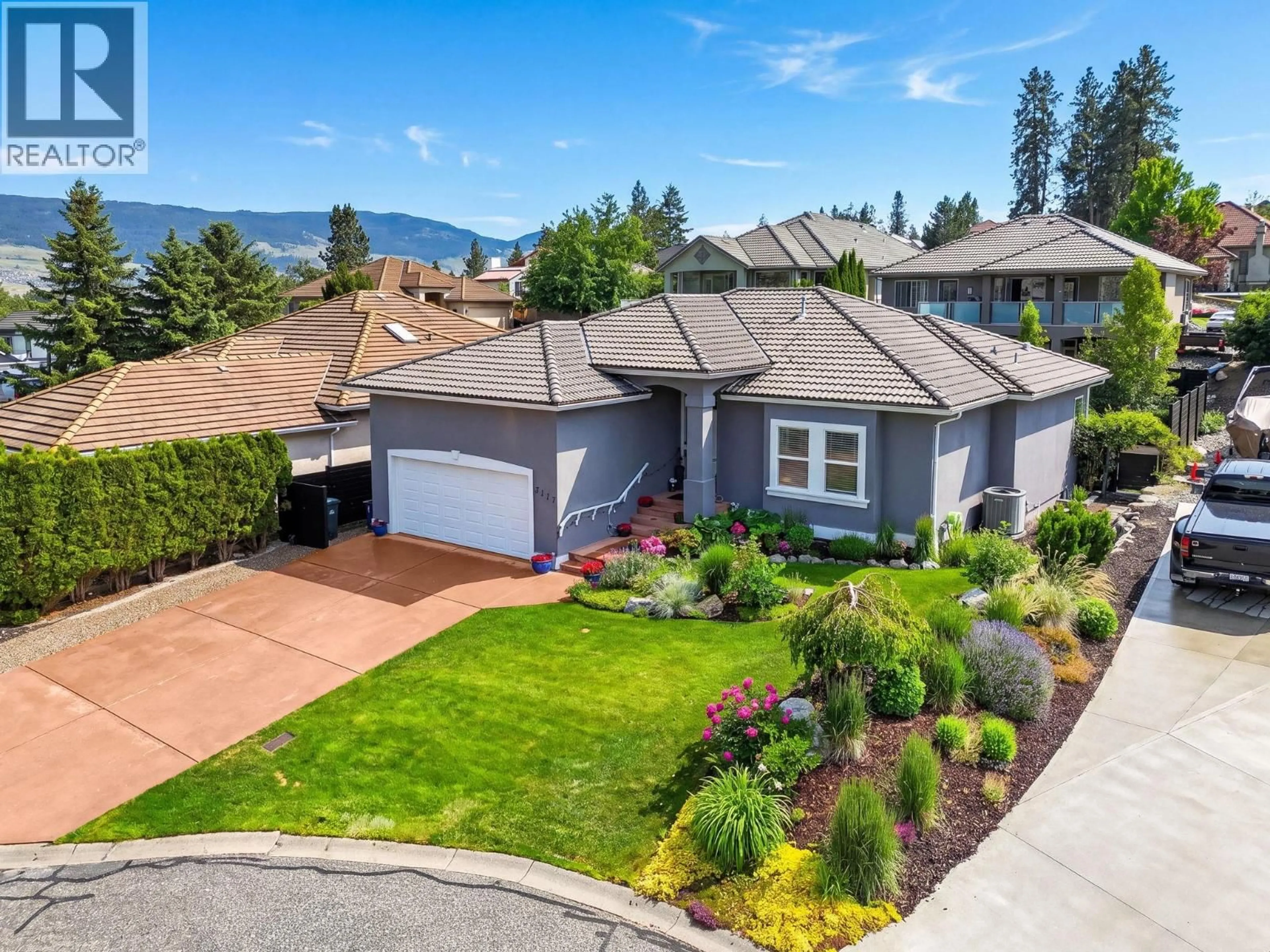 A pic from outside/outdoor area/front of a property/back of a property/a pic from drone, mountain view for 3117 CAPISTRANO COURT, Kelowna British Columbia V1V2A2