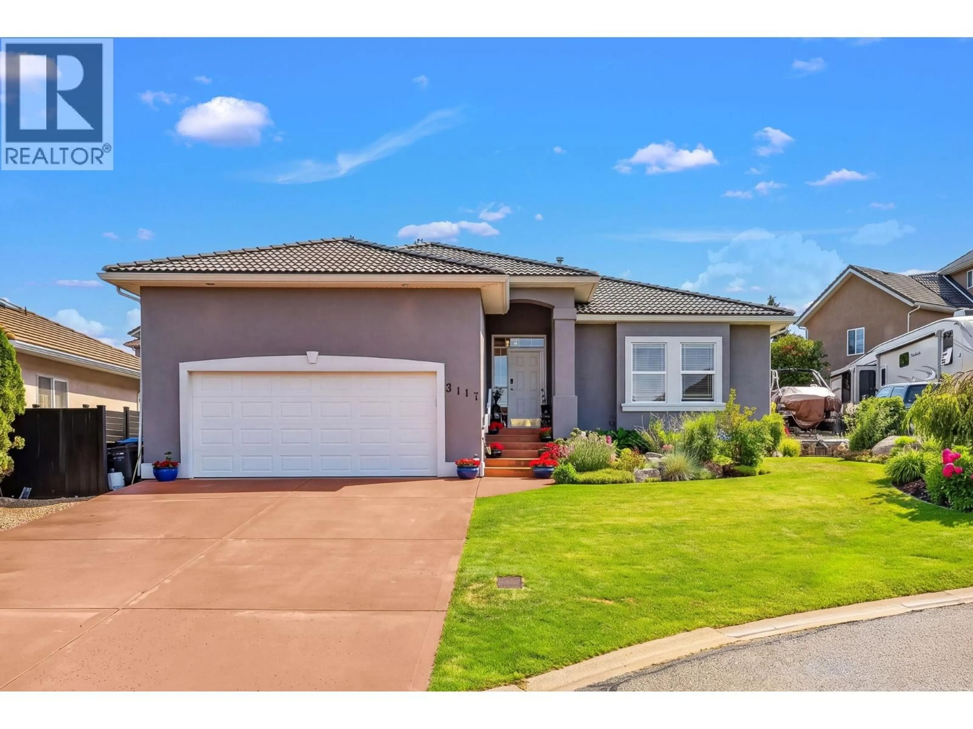 Home with vinyl exterior material, street for 3117 CAPISTRANO COURT, Kelowna British Columbia V1V2A2