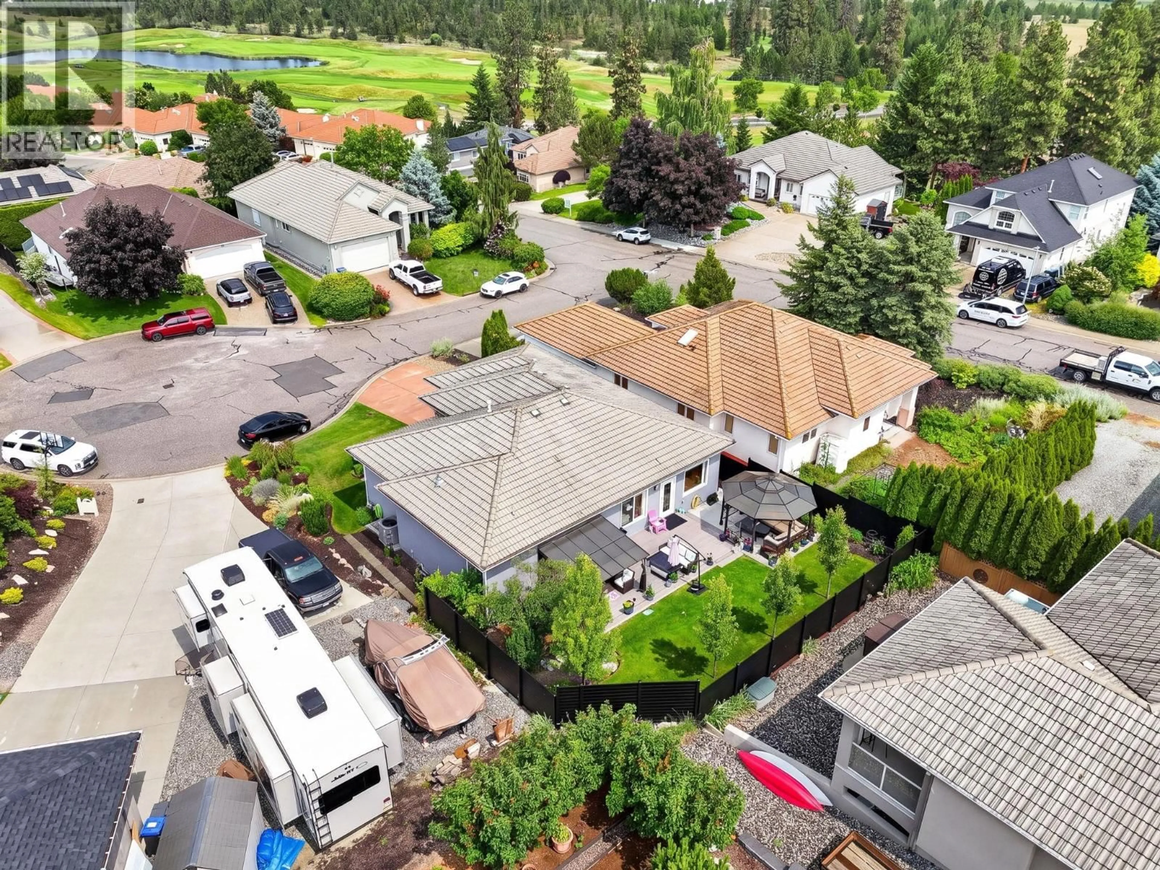 A pic from outside/outdoor area/front of a property/back of a property/a pic from drone, street for 3117 CAPISTRANO COURT, Kelowna British Columbia V1V2A2