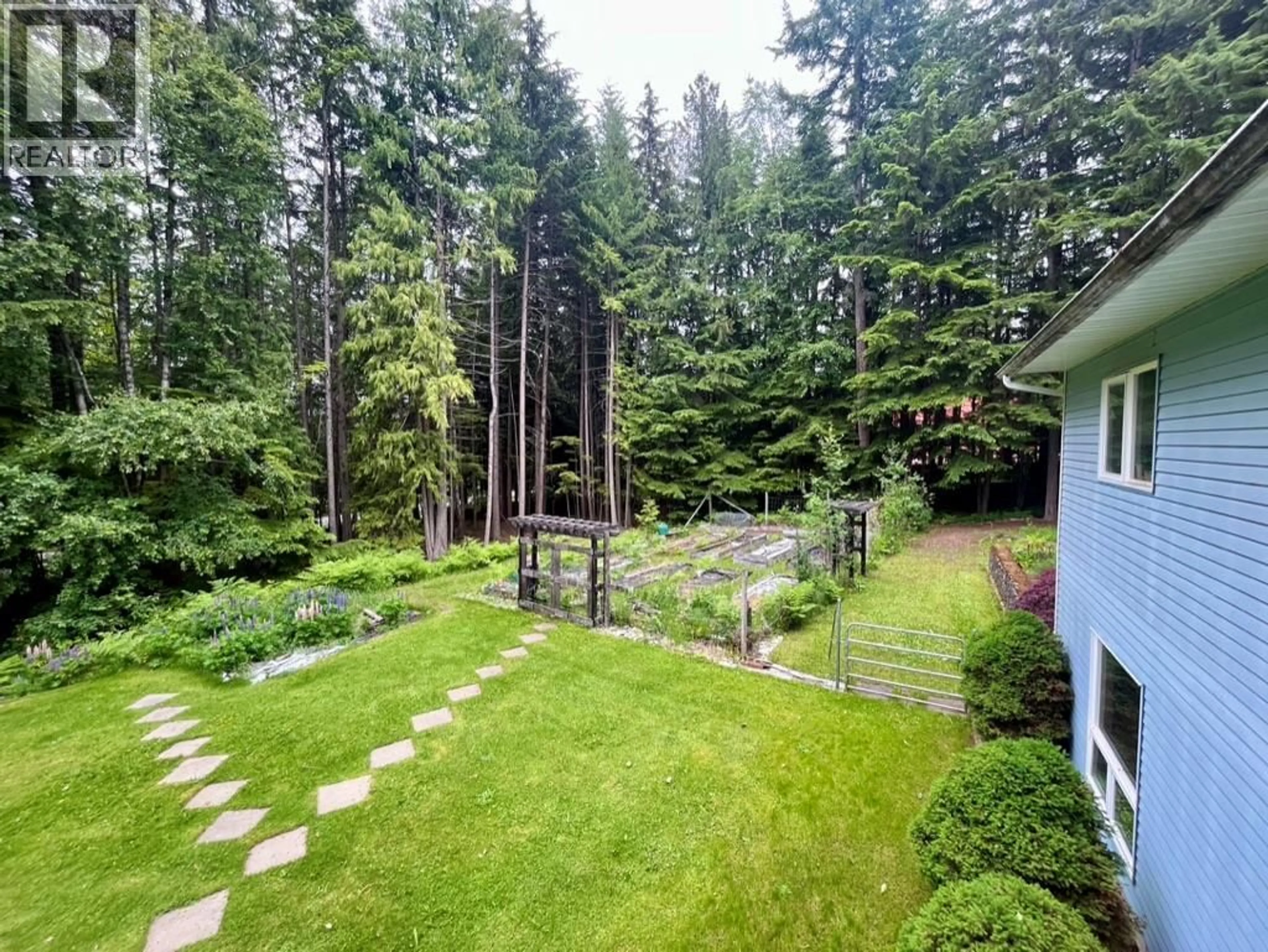 A pic from outside/outdoor area/front of a property/back of a property/a pic from drone, forest/trees view for 8254 PROCTER EAST ROAD, Procter British Columbia V1L0B6