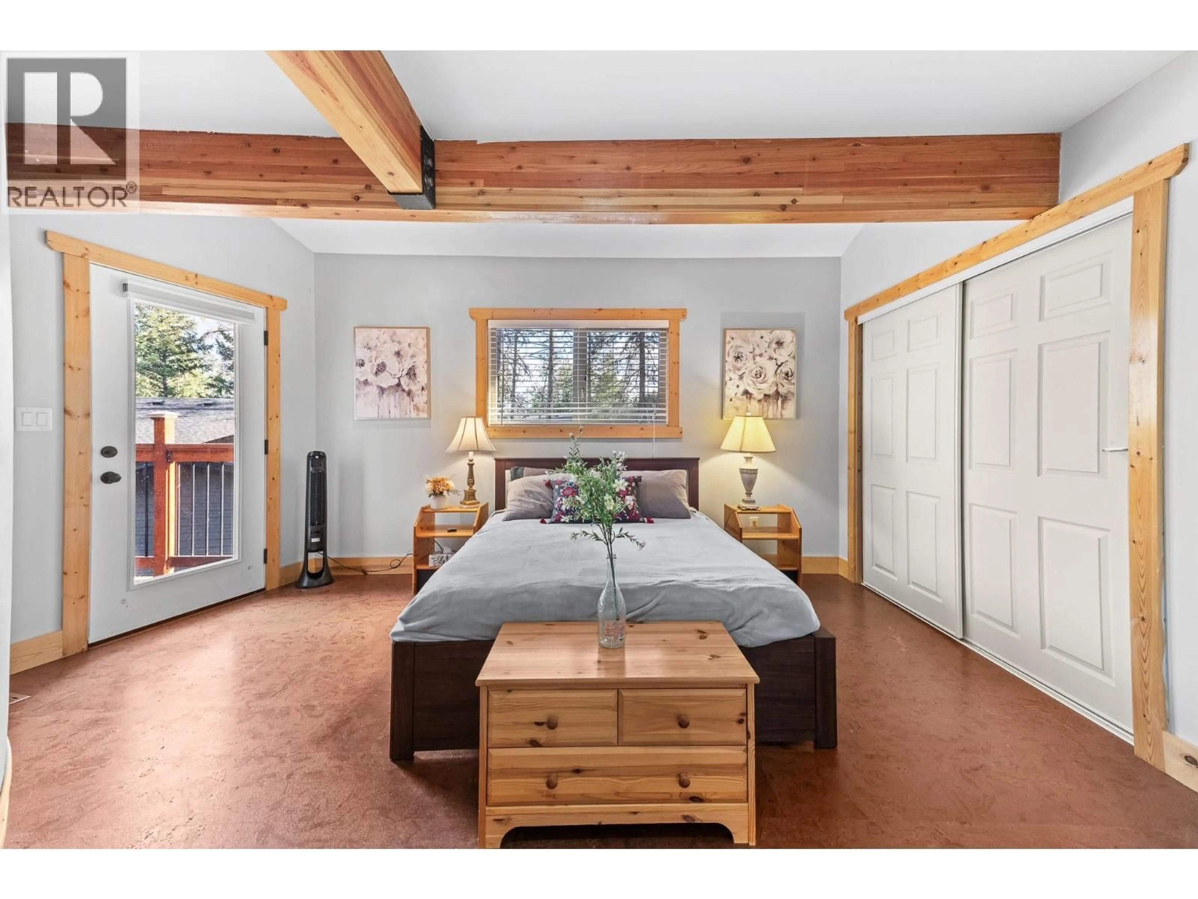 Bedroom with bed, wood/laminate floor for 9881 OSPREY LANDING DRIVE, Wardner British Columbia V0B2J0