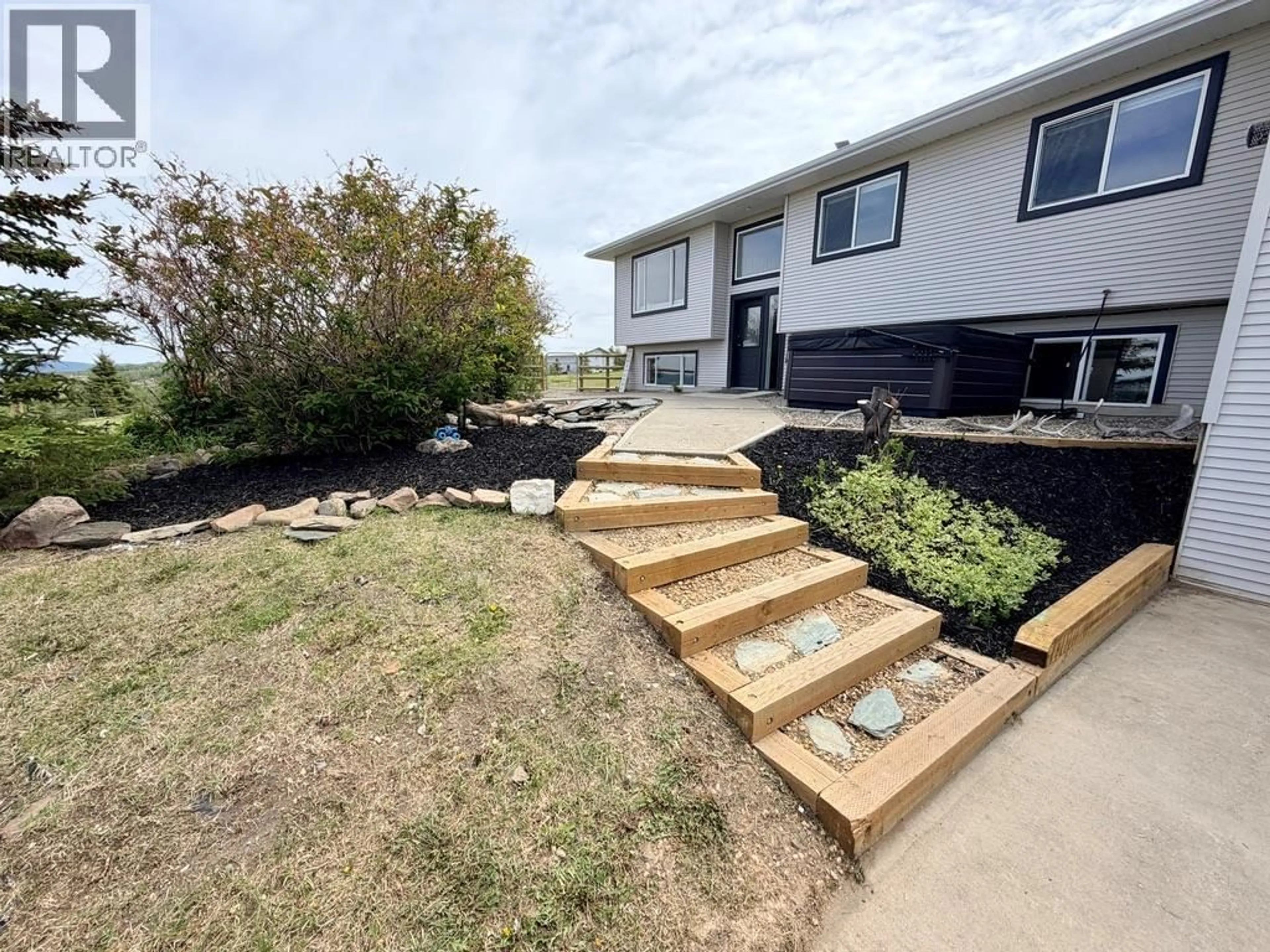 A pic from outside/outdoor area/front of a property/back of a property/a pic from drone, unknown for 1037 PARADISE VALLEY OTHER, Dawson Creek British Columbia V1G0H4