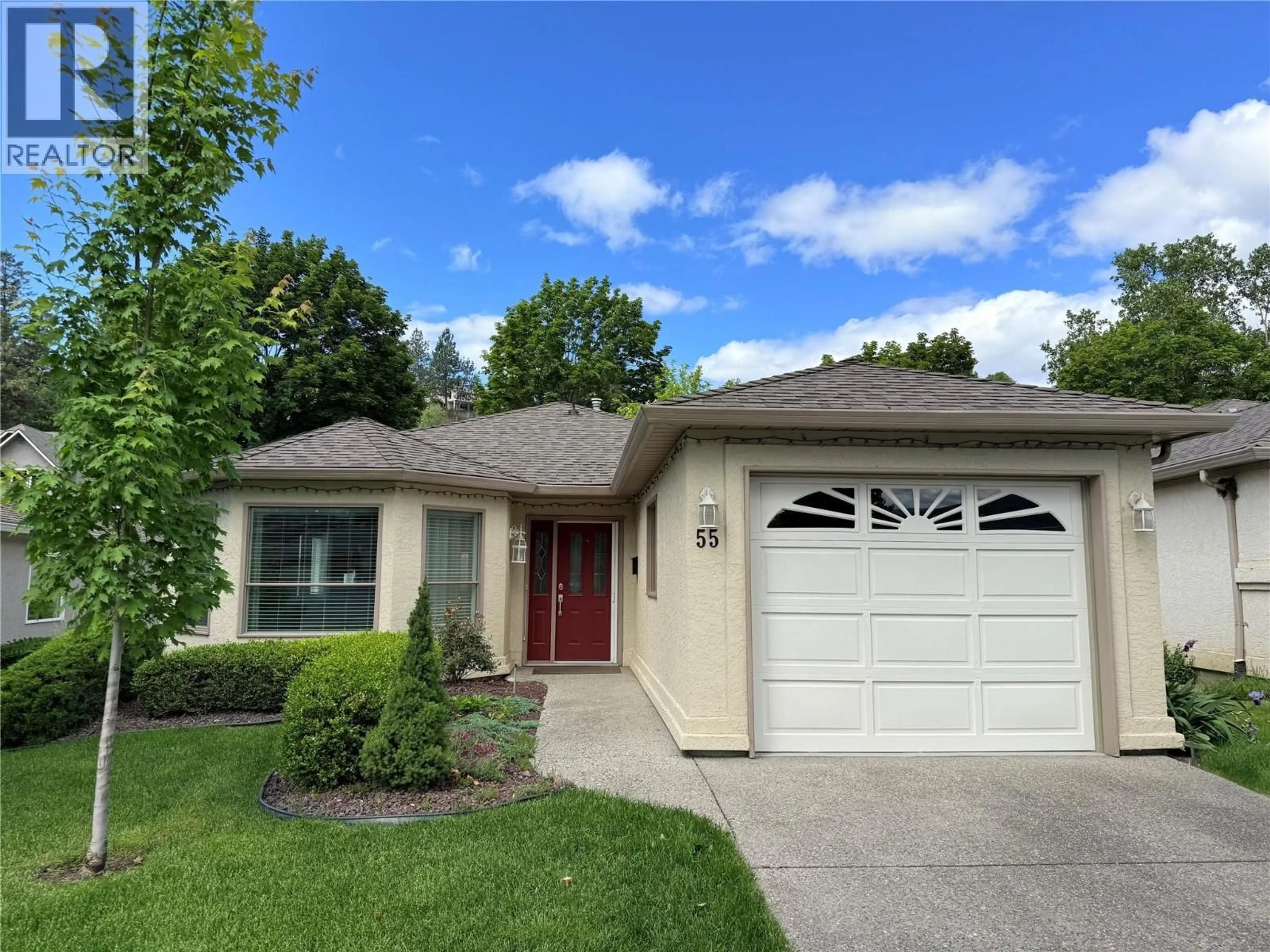 Home with vinyl exterior material, street for 55 - 615 GLENMEADOWS ROAD, Kelowna British Columbia V1V1N9