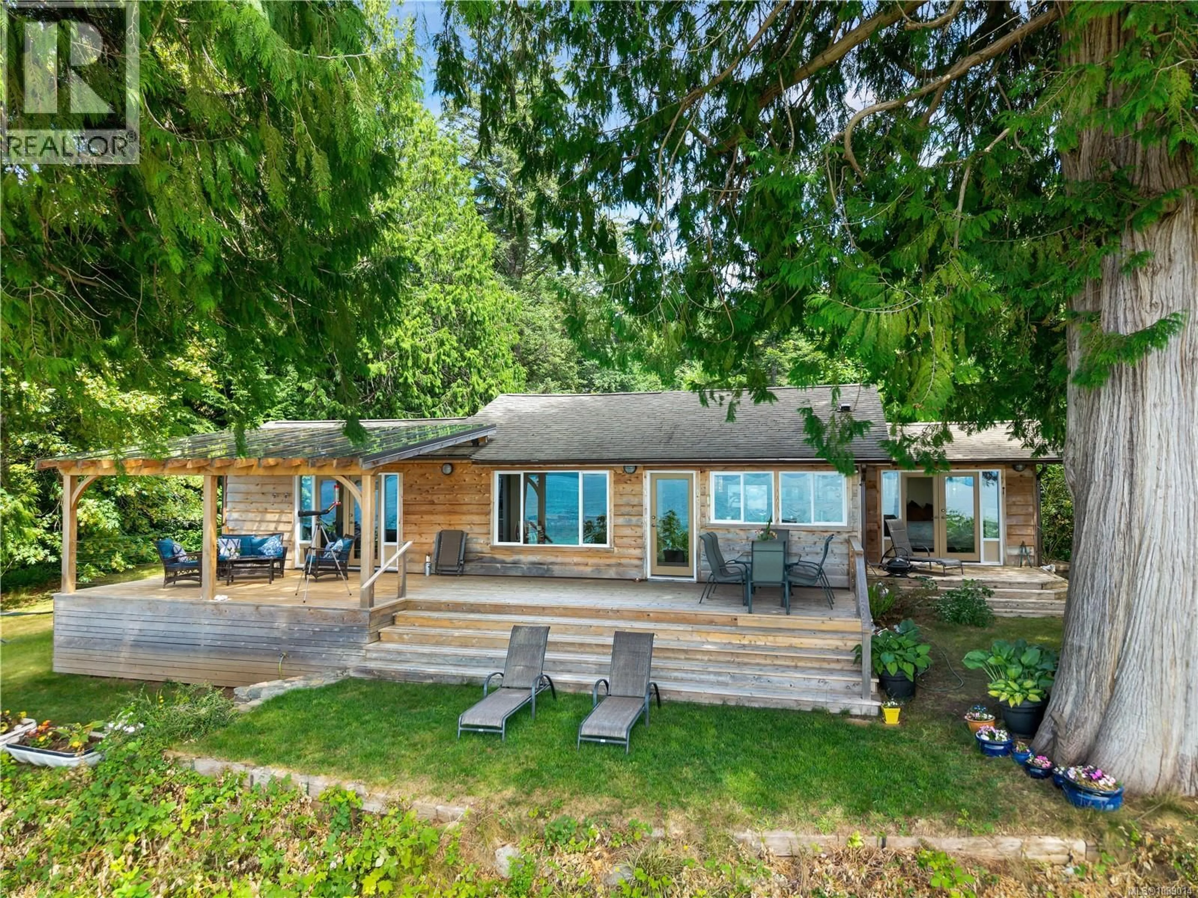 A pic from outside/outdoor area/front of a property/back of a property/a pic from drone, water/lake/river/ocean view for 569 POTLATCH ROAD, Cortes Island British Columbia V0P1K0