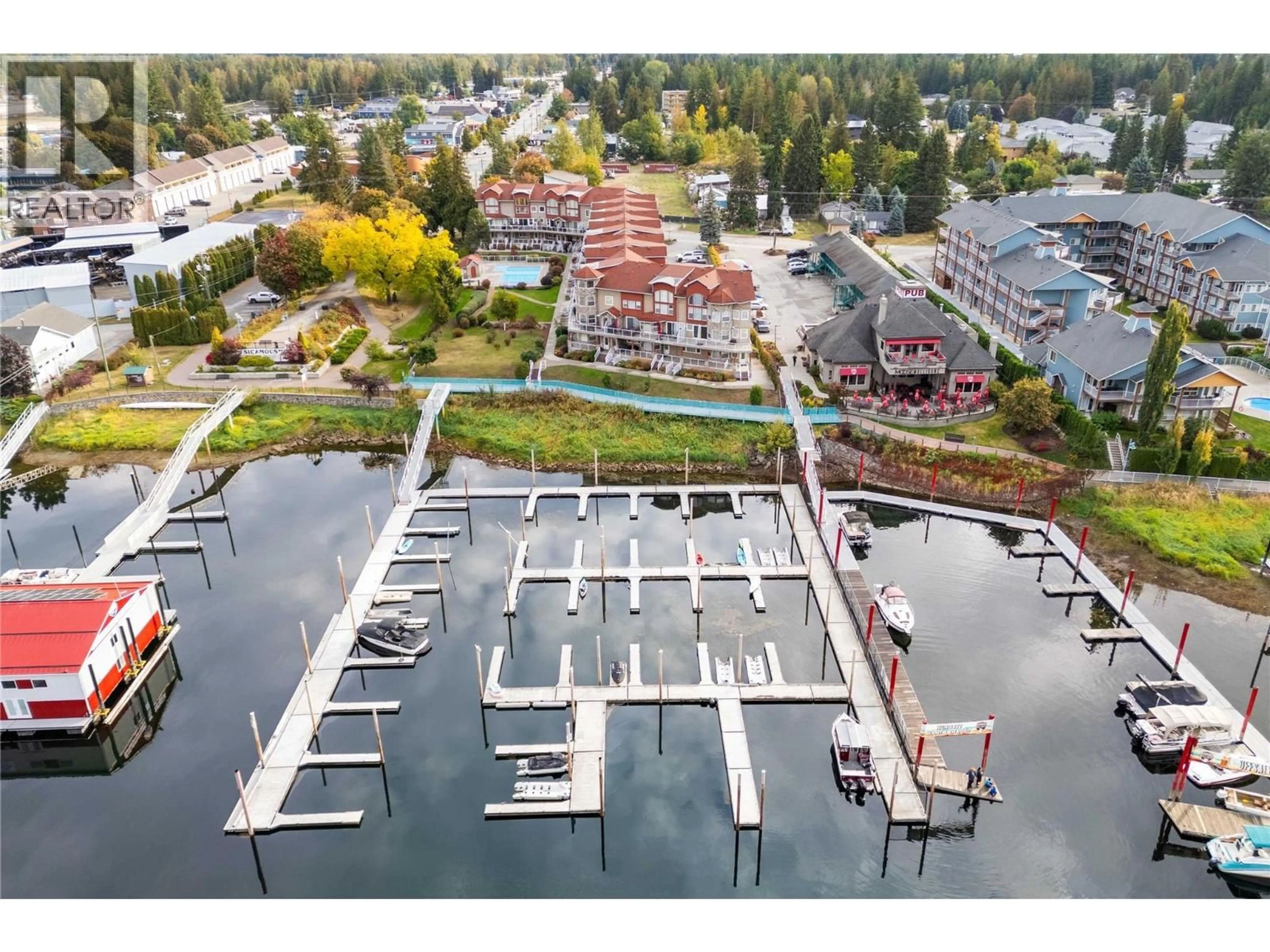A pic from outside/outdoor area/front of a property/back of a property/a pic from drone, water/lake/river/ocean view for 13 - 1130 RIVERSIDE AVENUE, Sicamous British Columbia V0E2V1