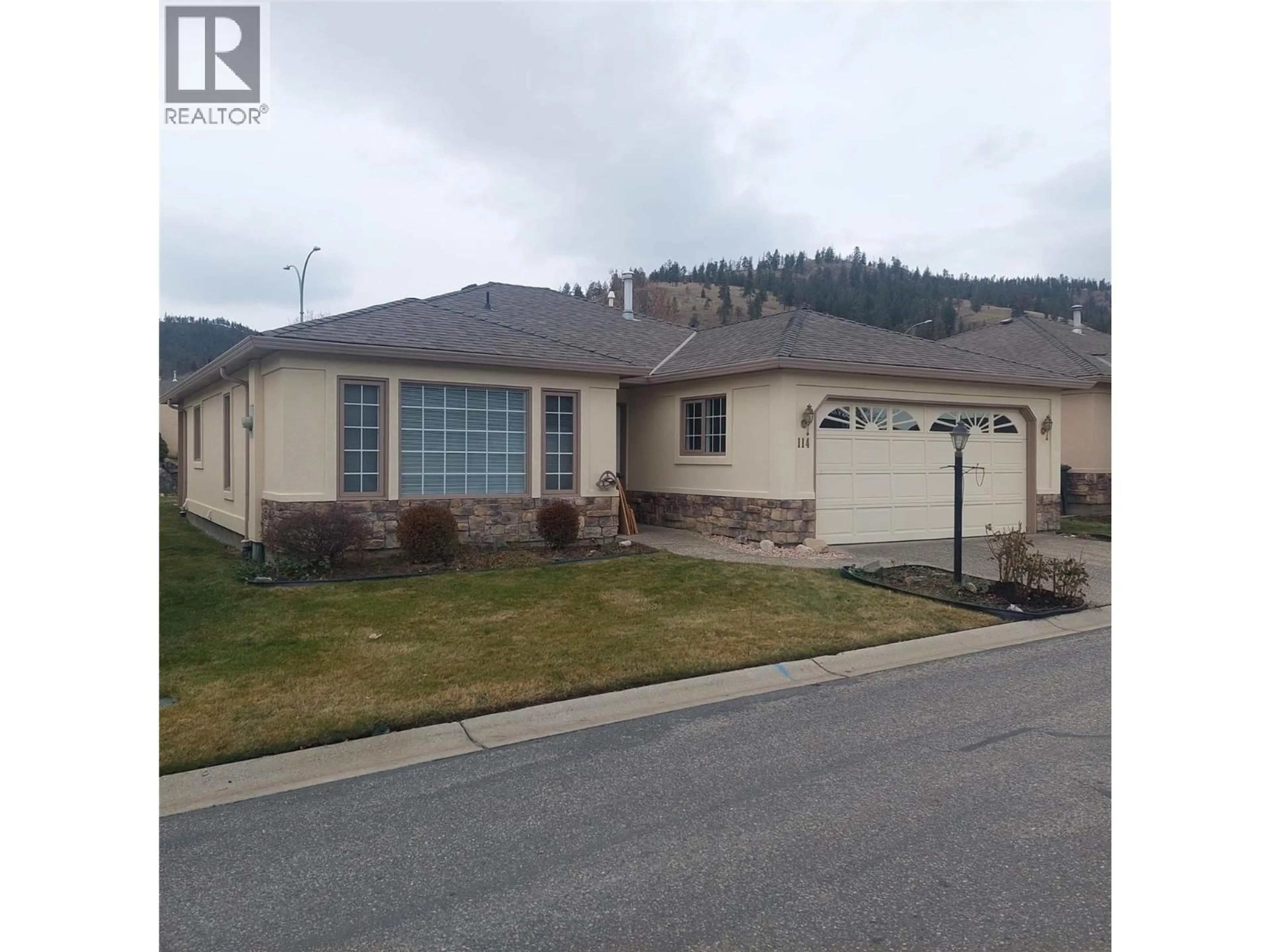 Home with vinyl exterior material, street for 114 - 595 YATES ROAD, Kelowna British Columbia V1V1P8