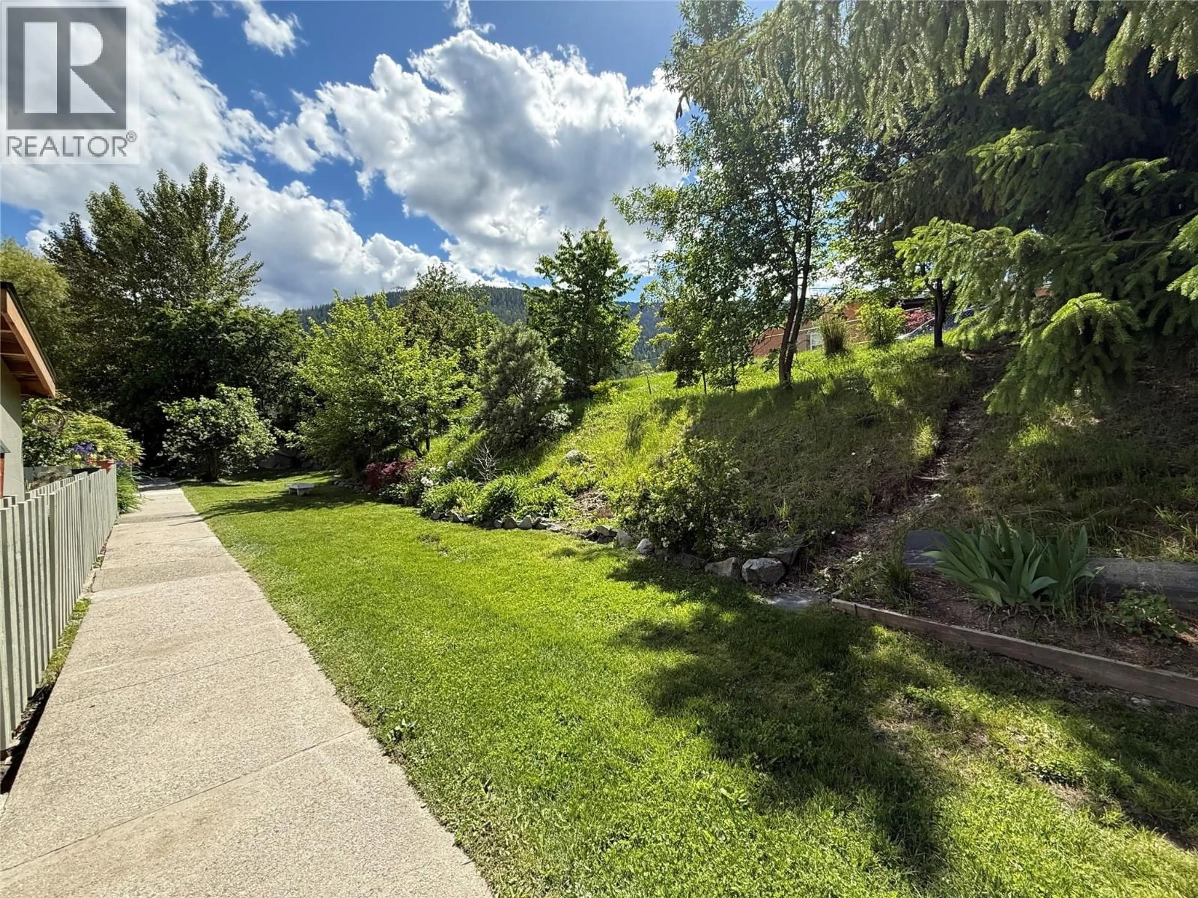 A pic from outside/outdoor area/front of a property/back of a property/a pic from drone, unknown for 467 RICHARDS STREET WEST, Nelson British Columbia V1L3K2