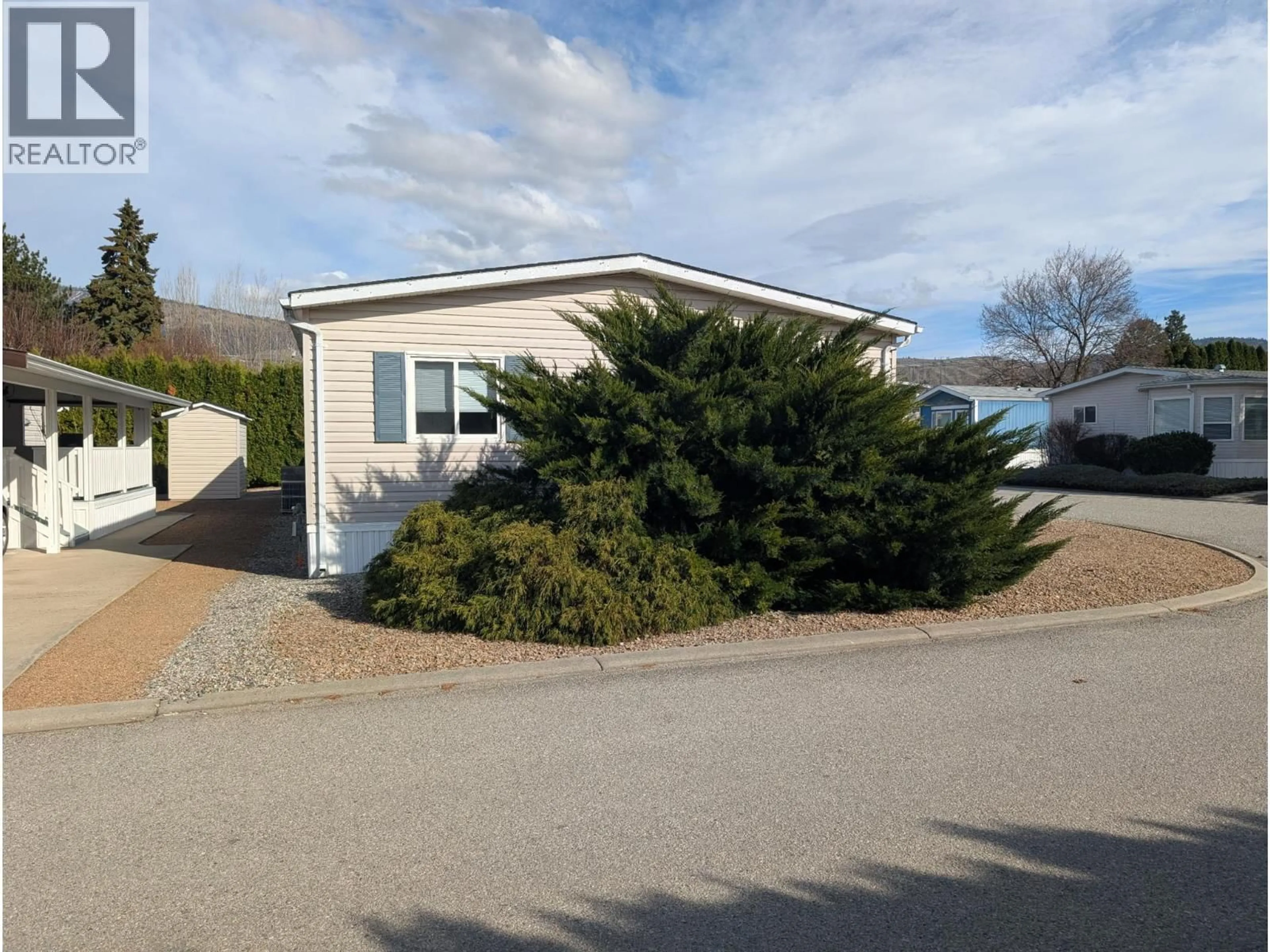 Home with vinyl exterior material, street for 47 - 6778 TUCELNUIT DRIVE, Oliver British Columbia V0H1T3