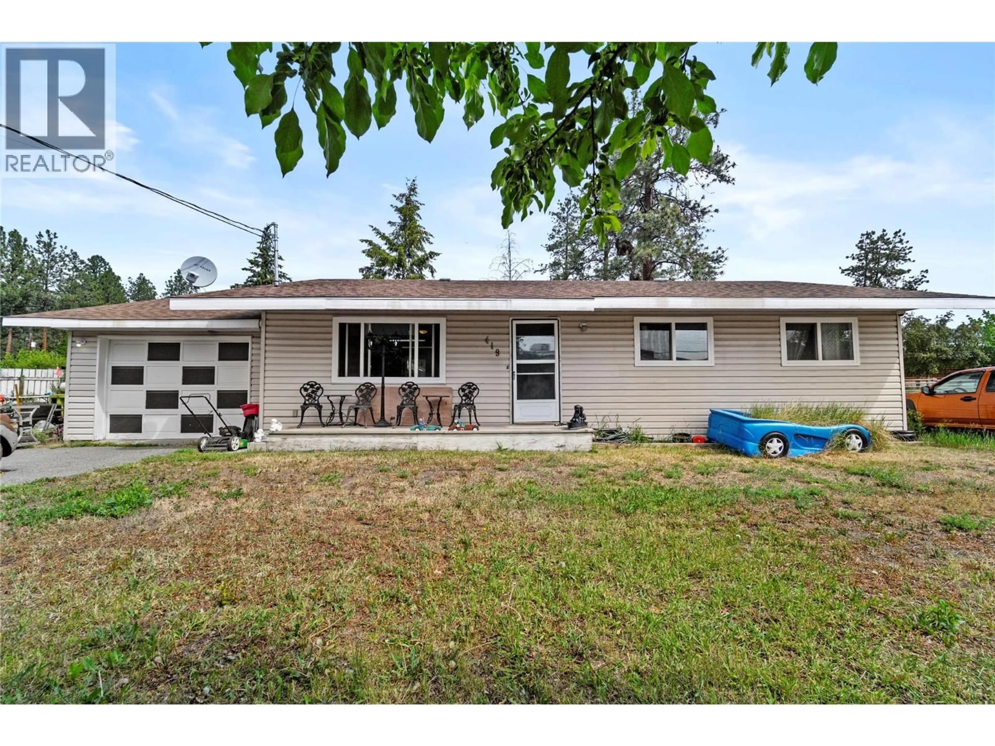 Home with vinyl exterior material, street for 419 DODDING AVENUE, Merritt British Columbia V0K1Y0