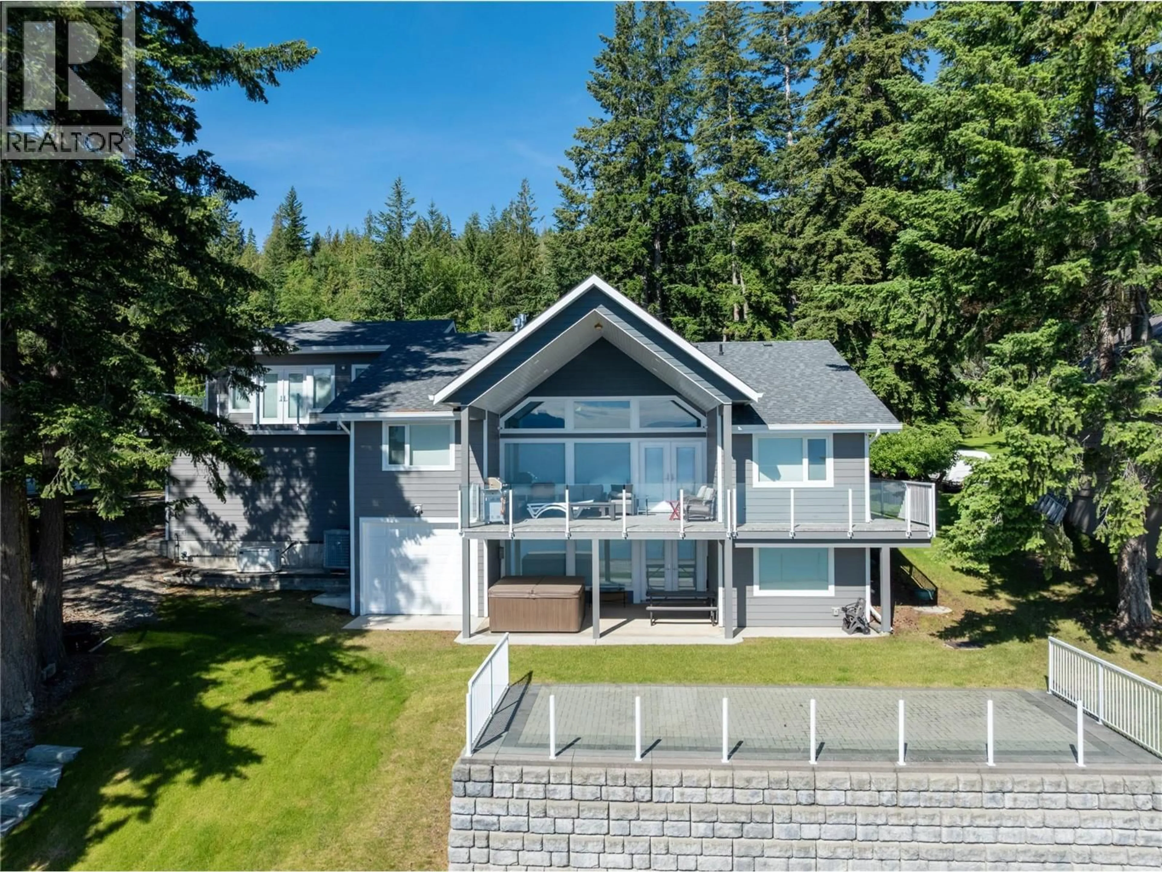 A pic from outside/outdoor area/front of a property/back of a property/a pic from drone, water/lake/river/ocean view for 6 - 4498 SQUILAX ANGLEMONT ROAD, Scotch Creek British Columbia V0E1M5