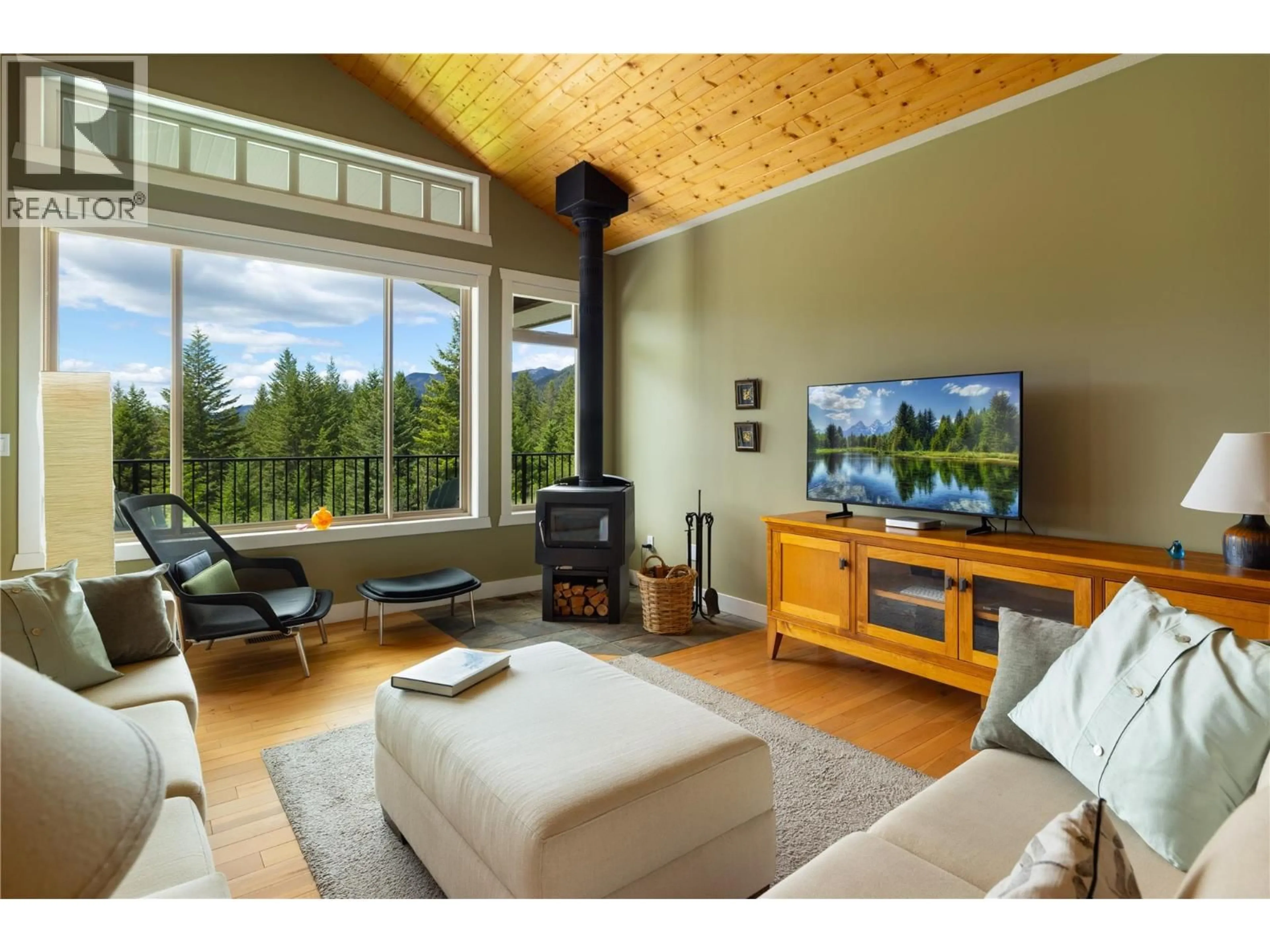 Living room with furniture, wood/laminate floor for 5128 BOLEAN LAKE ROAD, Falkland British Columbia V0E1W0