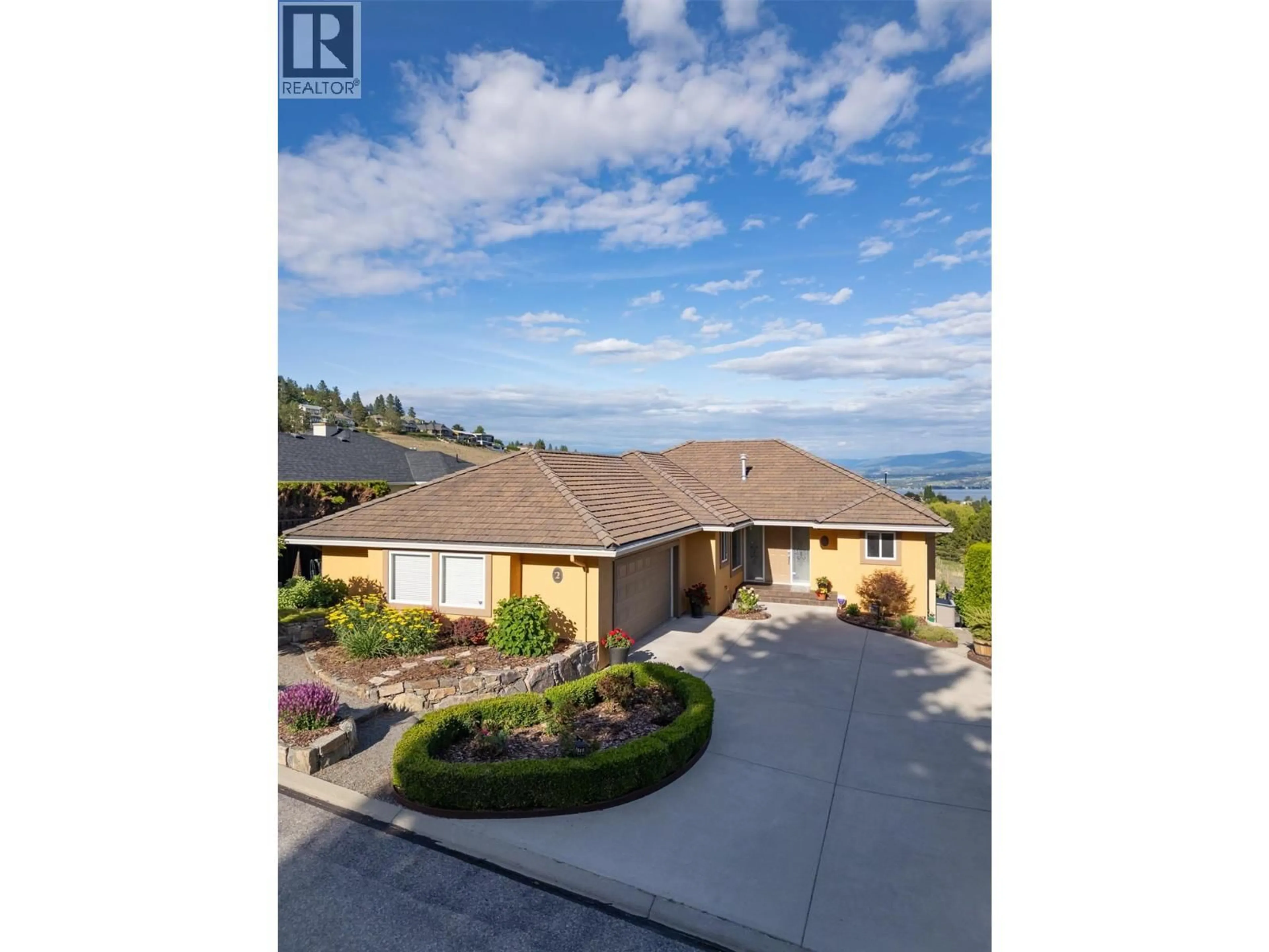 A pic from outside/outdoor area/front of a property/back of a property/a pic from drone, water/lake/river/ocean view for 2 - 3333 CHANCELLOR PLACE, West Kelowna British Columbia V4T2S9