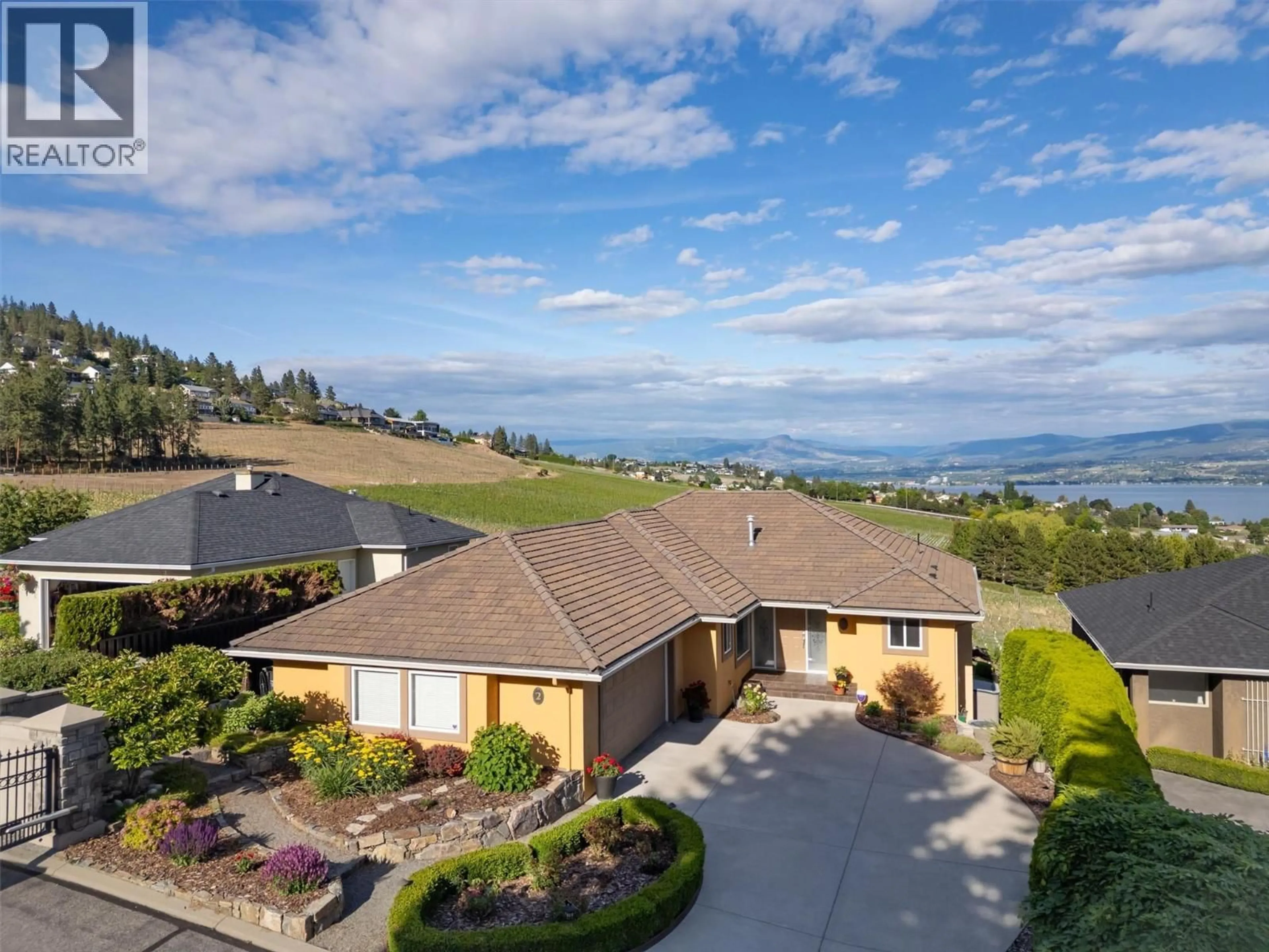 A pic from outside/outdoor area/front of a property/back of a property/a pic from drone, mountain view for 2 - 3333 CHANCELLOR PLACE, West Kelowna British Columbia V4T2S9