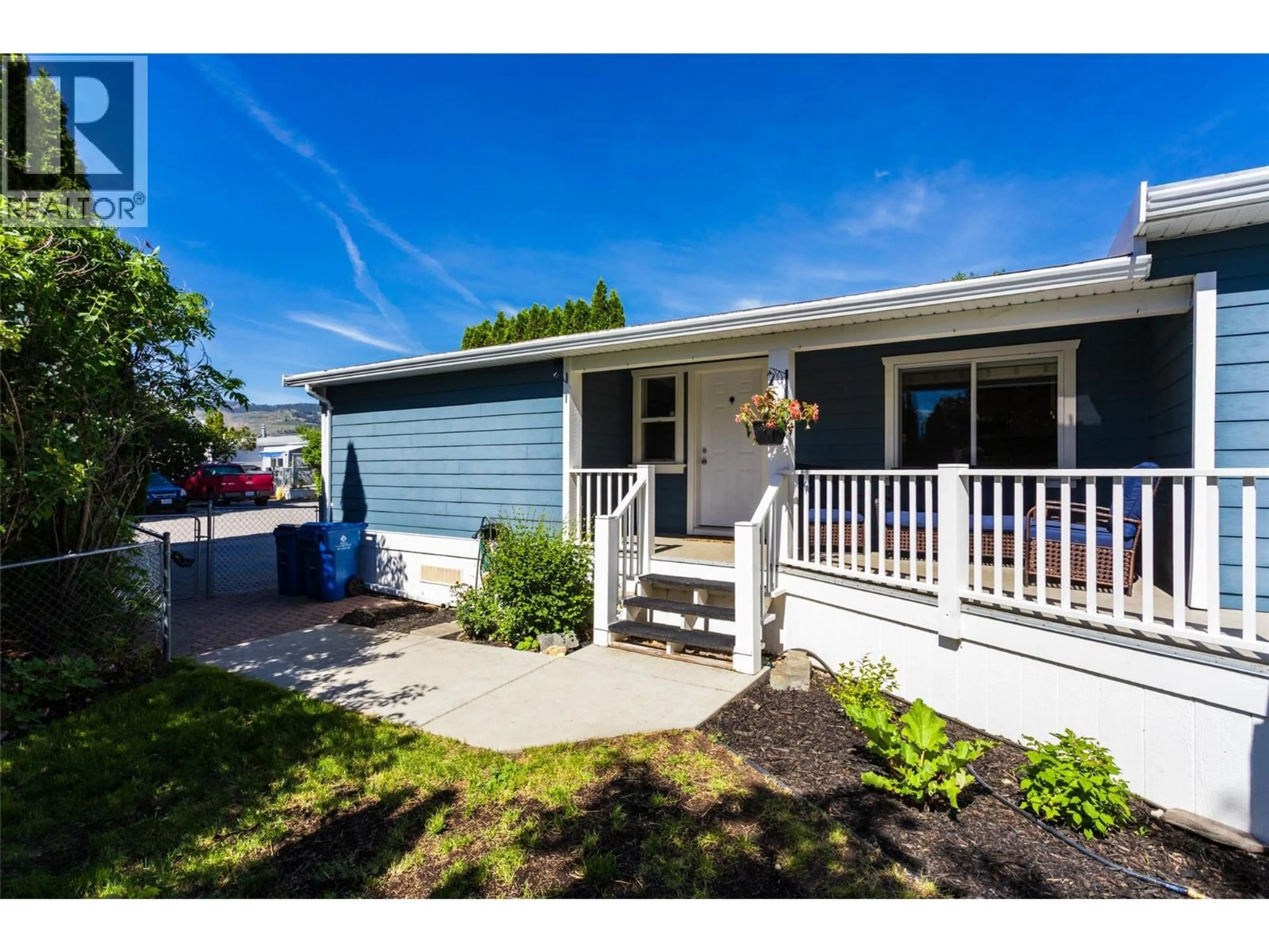 Home with vinyl exterior material, street for 13 - 3381 VILLAGE GREEN WAY, West Kelowna British Columbia V4T1L2