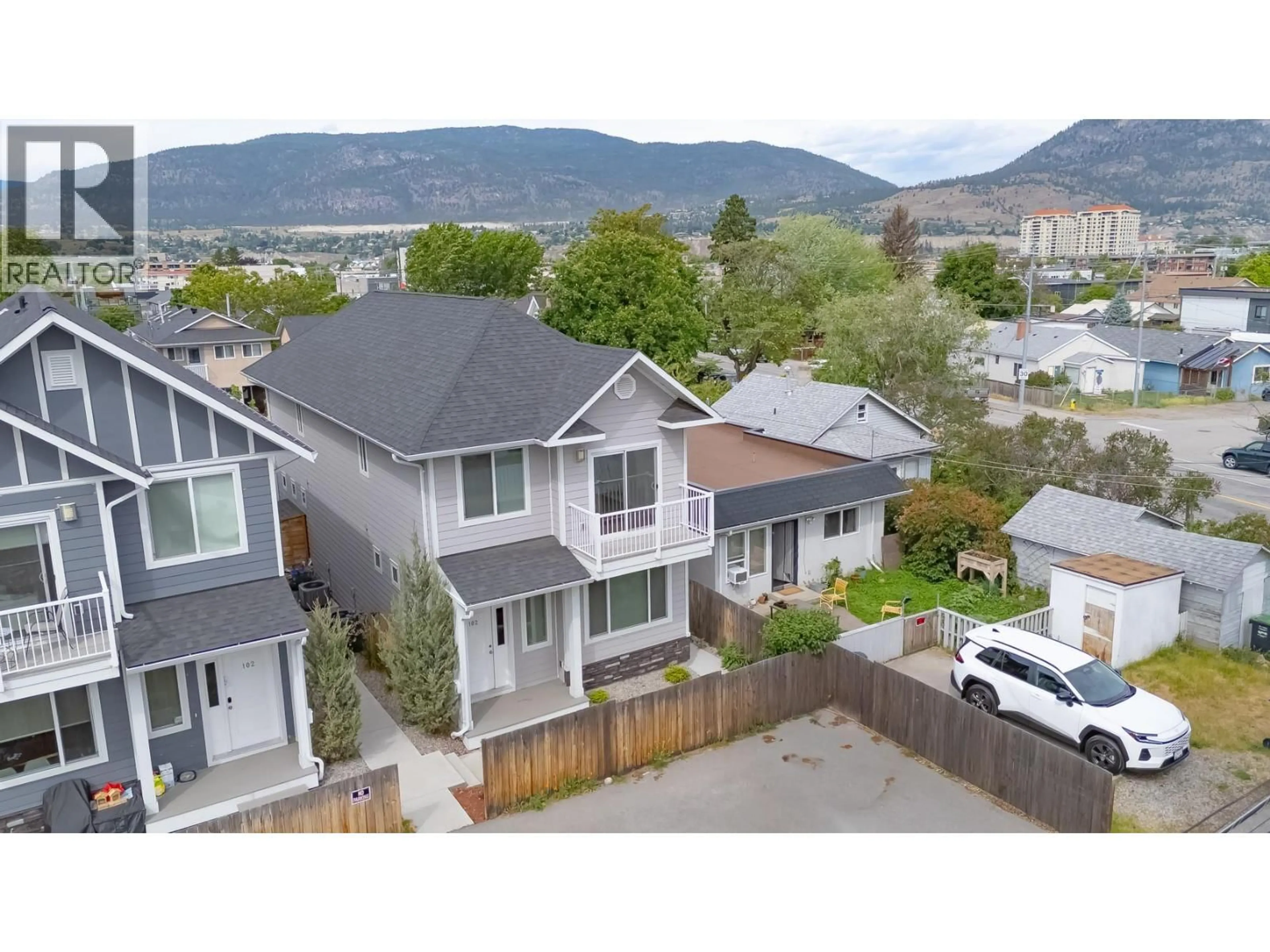 A pic from outside/outdoor area/front of a property/back of a property/a pic from drone, mountain view for 102 - 424 BRAID STREET, Penticton British Columbia V2A4Y2