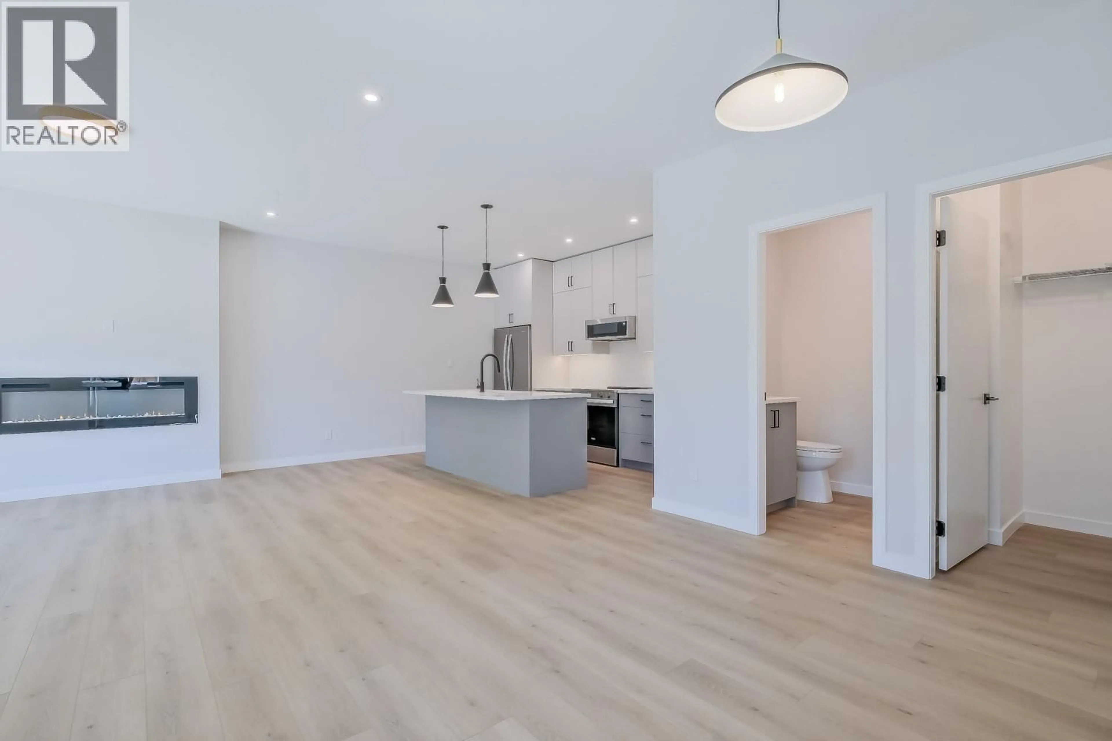 Open concept kitchen, unknown for 102 - 177 KIRKPATRICK AVENUE, Penticton British Columbia V2A3P4