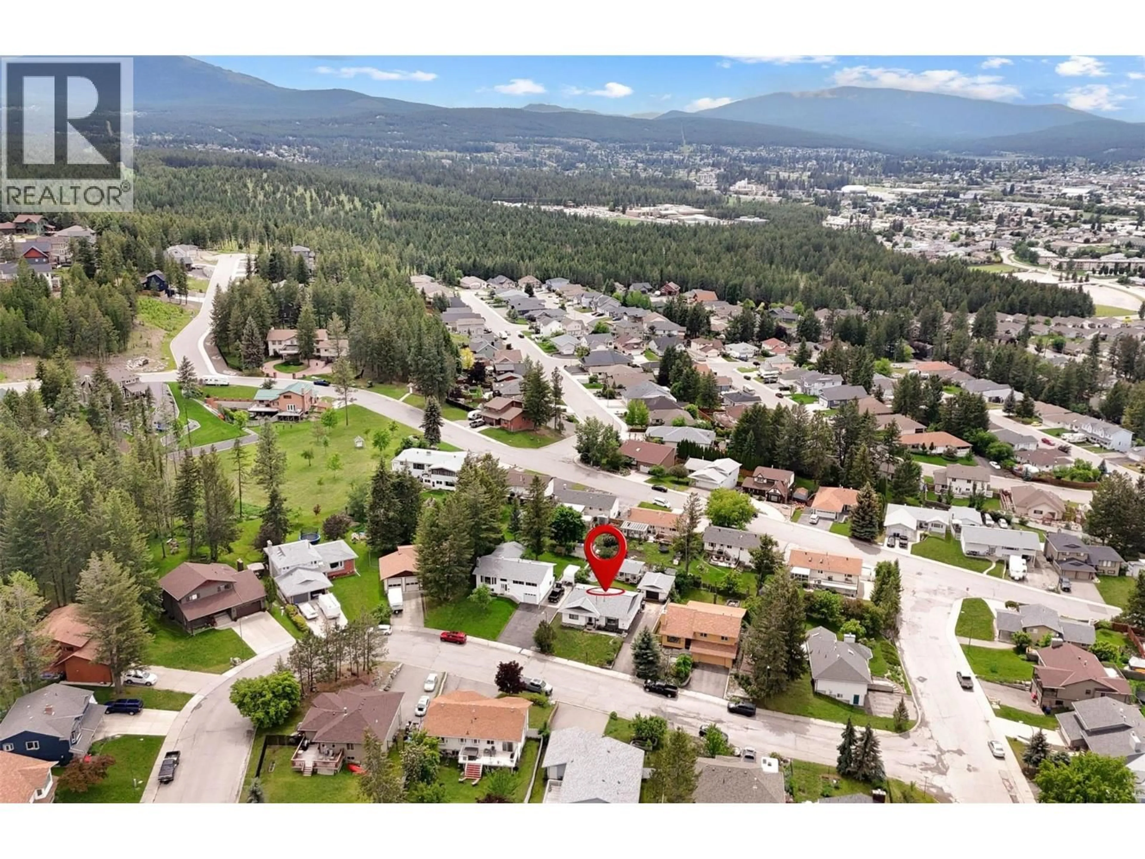 A pic from outside/outdoor area/front of a property/back of a property/a pic from drone, mountain view for 1708 MT NELSON CRESCENT, Cranbrook British Columbia V1C5T7