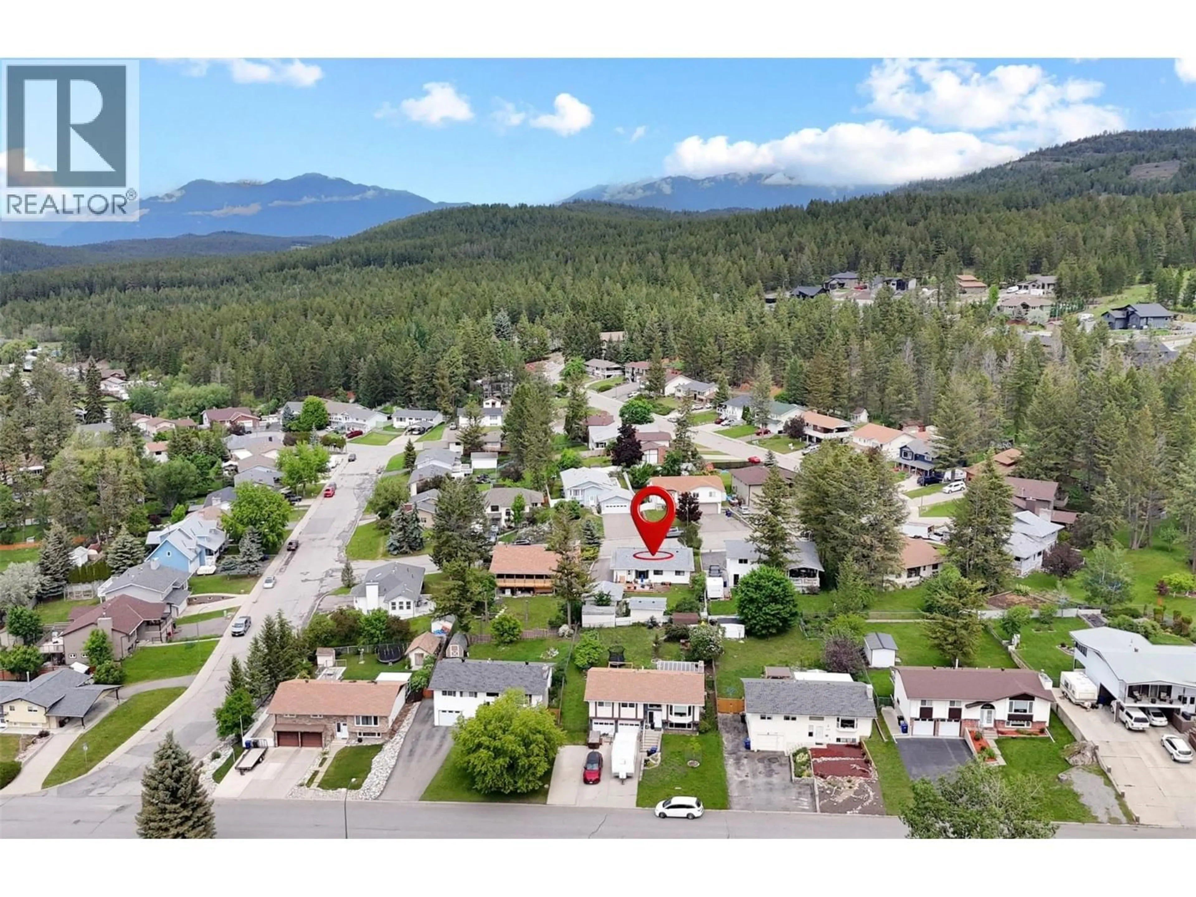 A pic from outside/outdoor area/front of a property/back of a property/a pic from drone, mountain view for 1708 MT NELSON CRESCENT, Cranbrook British Columbia V1C5T7