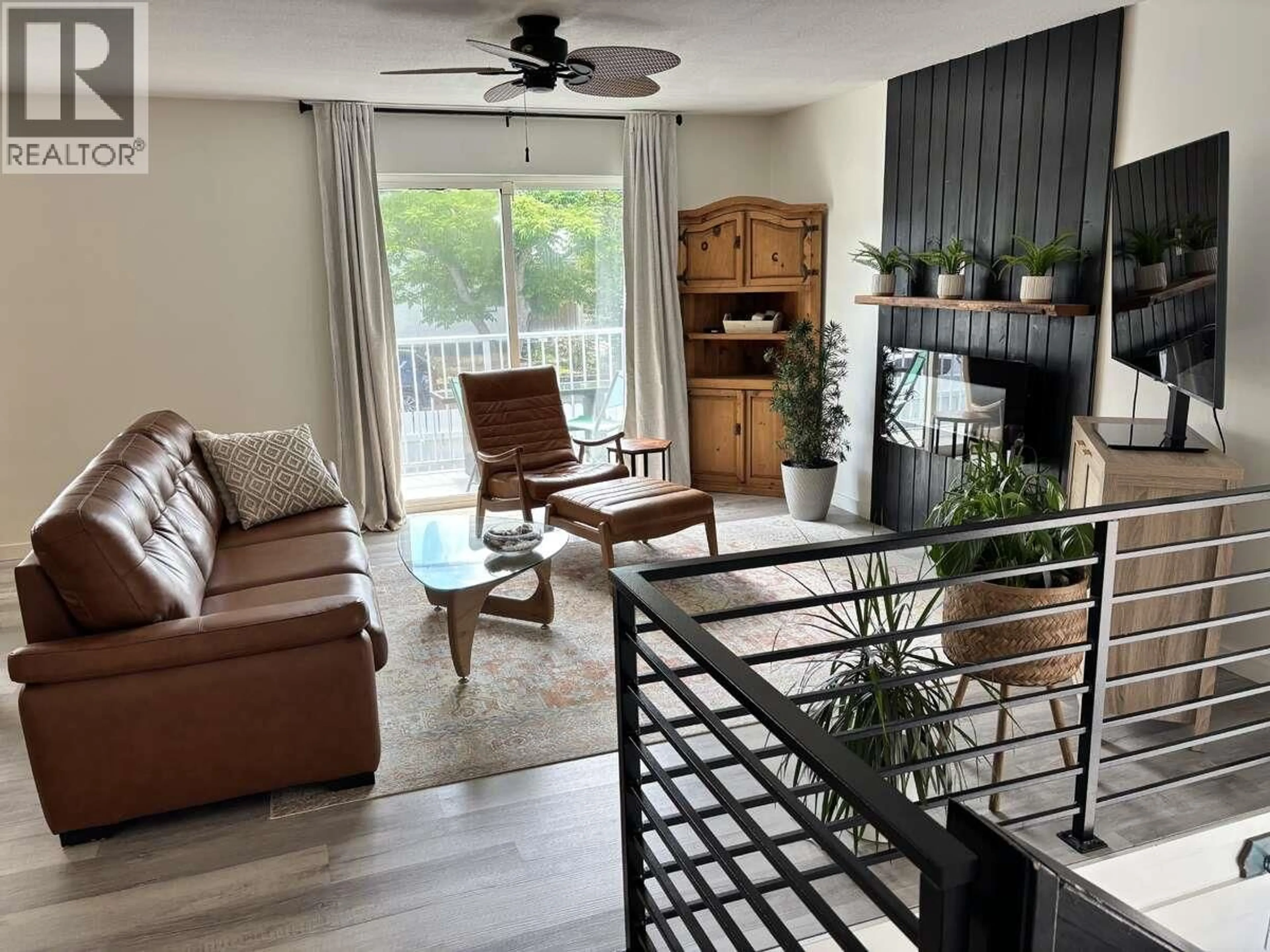 Living room with furniture, wood/laminate floor for 453 ALEXANDER AVENUE, Penticton British Columbia V2A1E6
