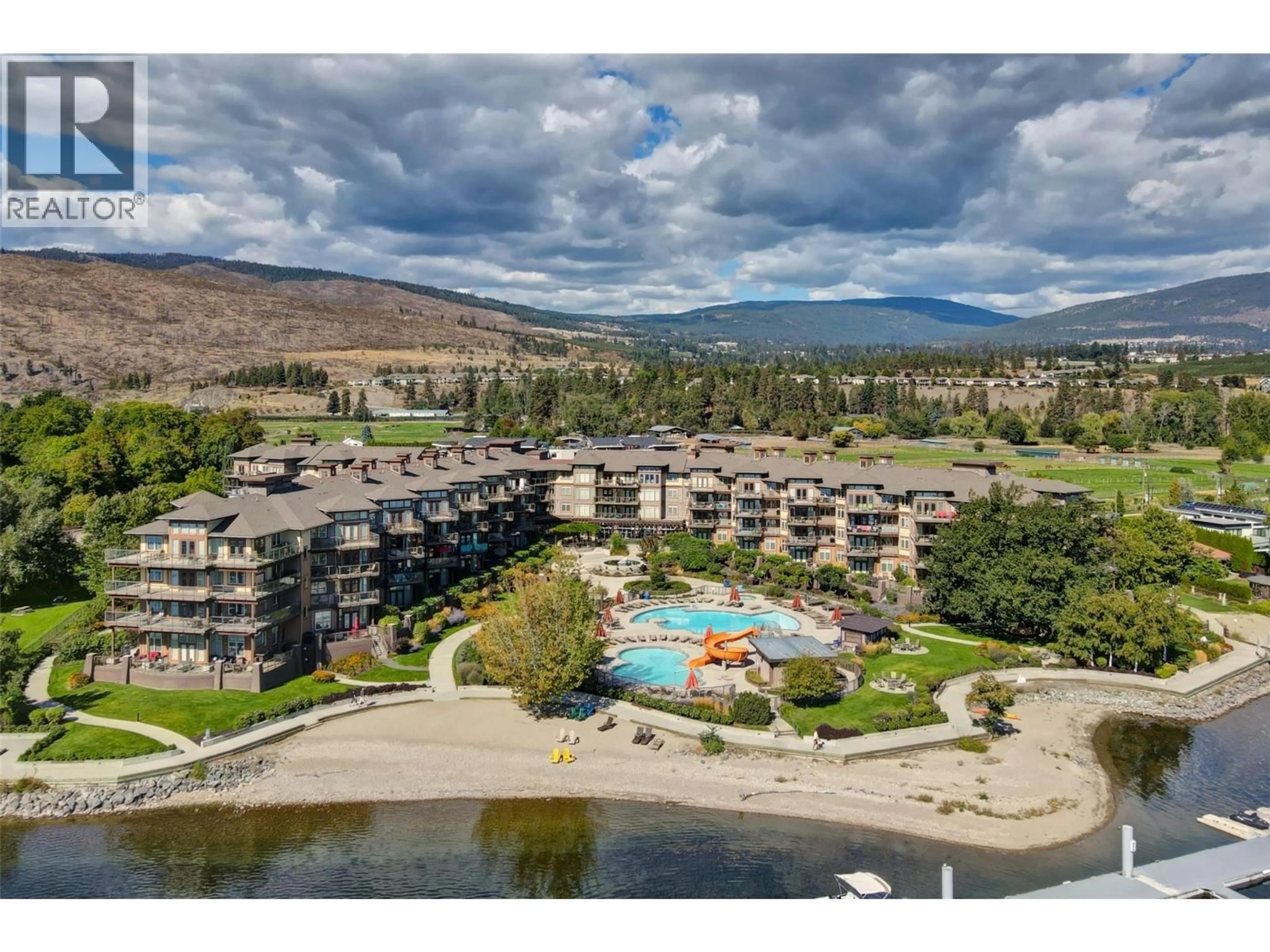A pic from outside/outdoor area/front of a property/back of a property/a pic from drone, water/lake/river/ocean view for 301 - 4205 GELLATLY ROAD, West Kelowna British Columbia V4T2K2