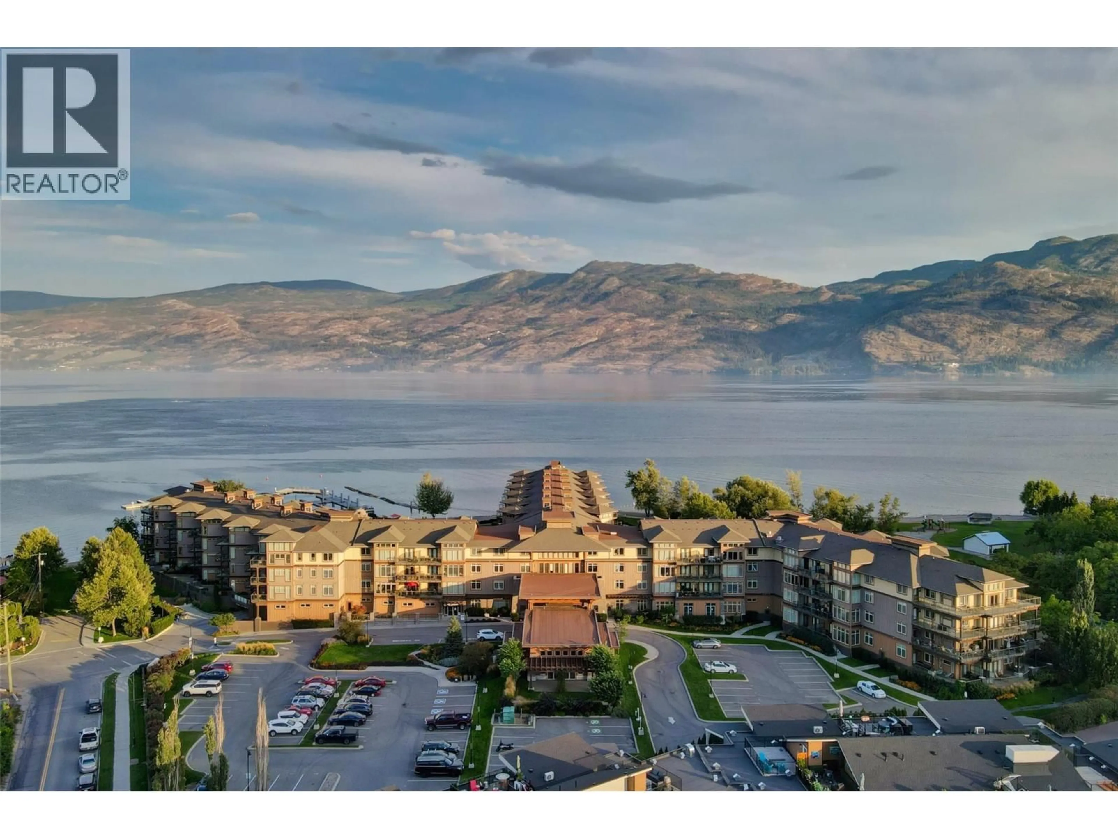 A pic from outside/outdoor area/front of a property/back of a property/a pic from drone, mountain view for 301 - 4205 GELLATLY ROAD, West Kelowna British Columbia V4T2K2