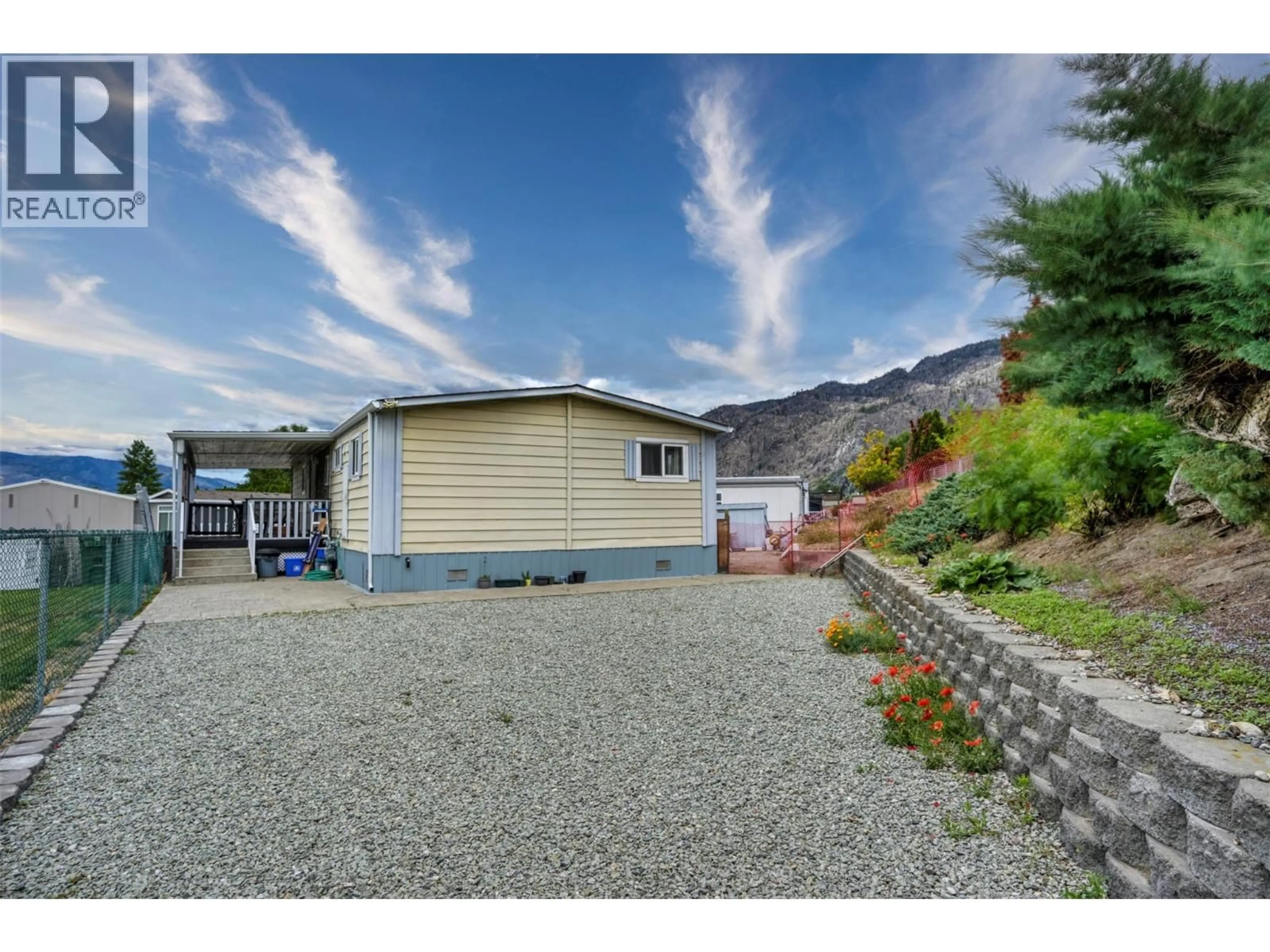 Home with vinyl exterior material, mountain view for 4911 CEDAR LANE LANE, Osoyoos British Columbia V0H1V3